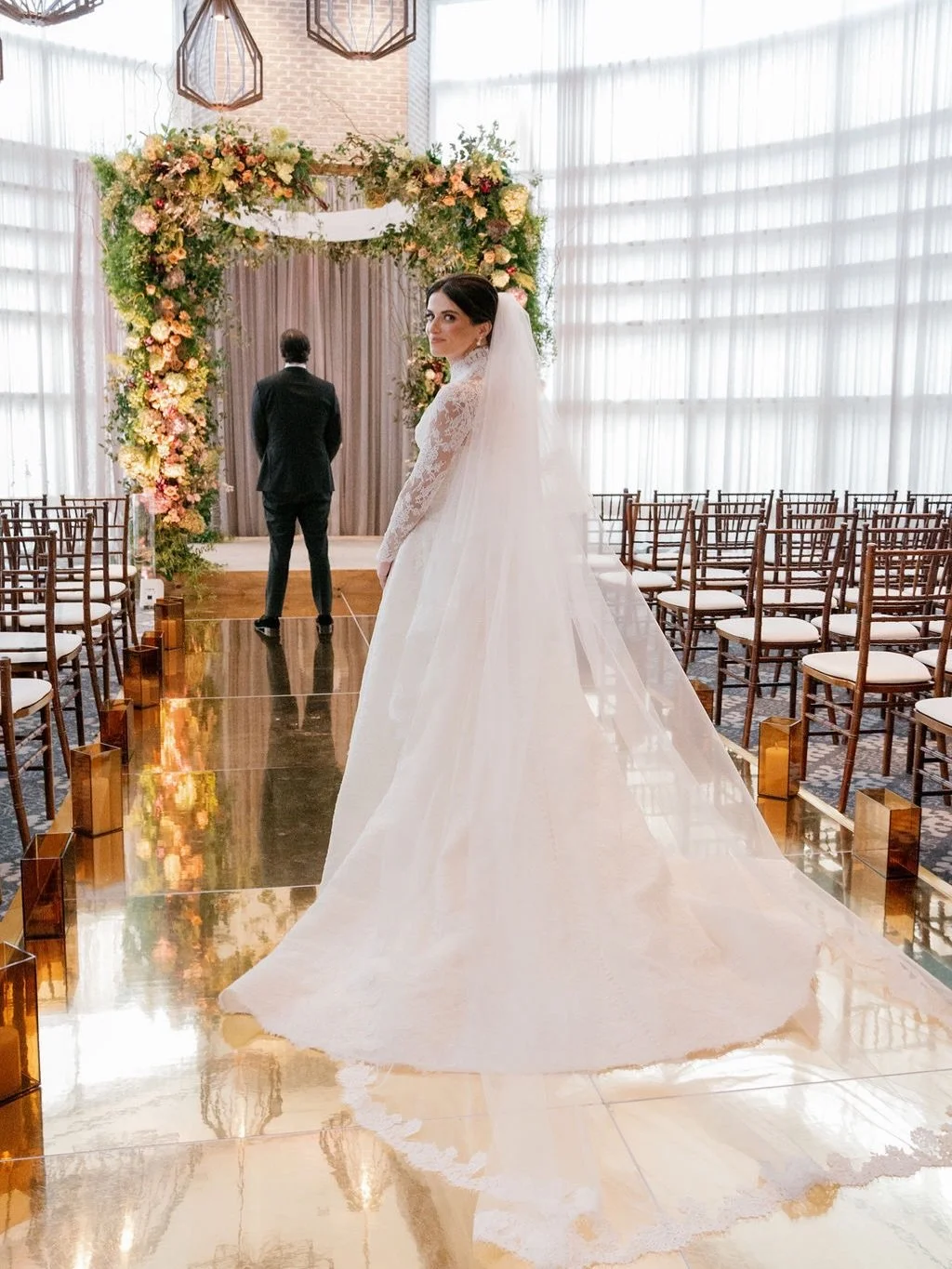 Reflecting on this quite literal reflective aisle&mdash;glowing just enough to hold its own, but never outshining Stephanie. It set the tone for a breathtaking entrance.
⠀⠀⠀⠀⠀⠀⠀⠀⠀
⠀⠀⠀⠀⠀⠀⠀⠀⠀
@laurastonephoto
@tophermackatl
@atlantadancefloors
@hotelat