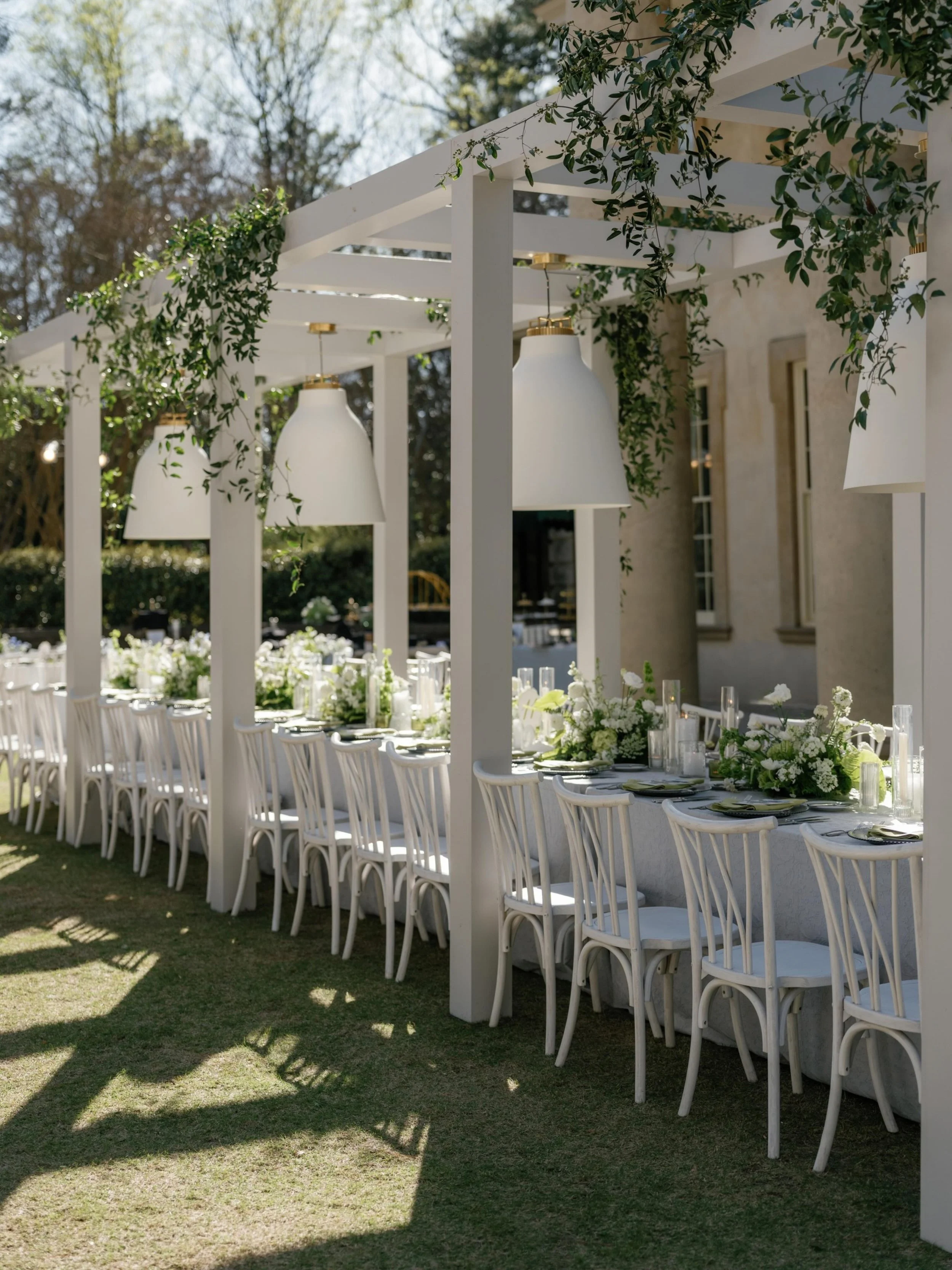 For Clara and Alex at the Swan House, the lighting was not just there to help people see the reception. It was part of the design.

The hanging lanterns over the head table, the sconce lighting at the bar, and lamps tucked into the tablescape gave th