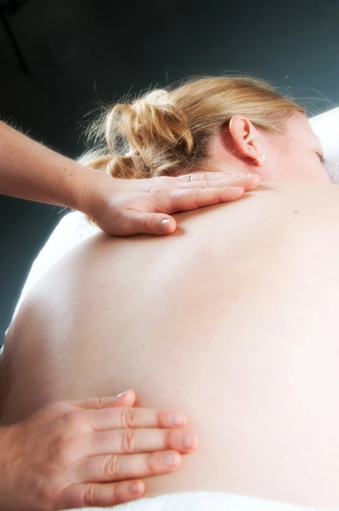Sandra Dumas giving a back massage-holistic therapies