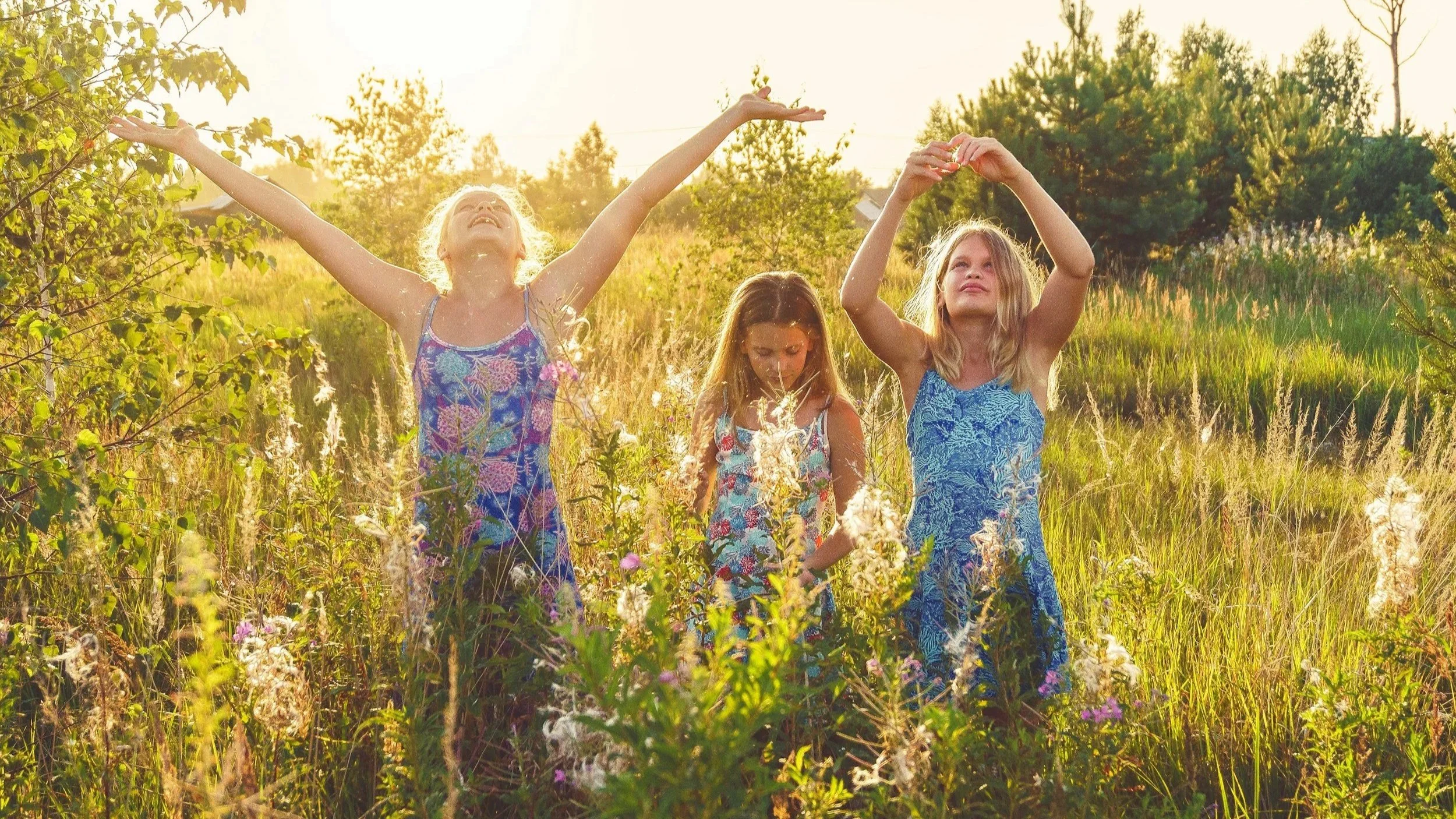 Kids having fun in the summer in a field in Ohio