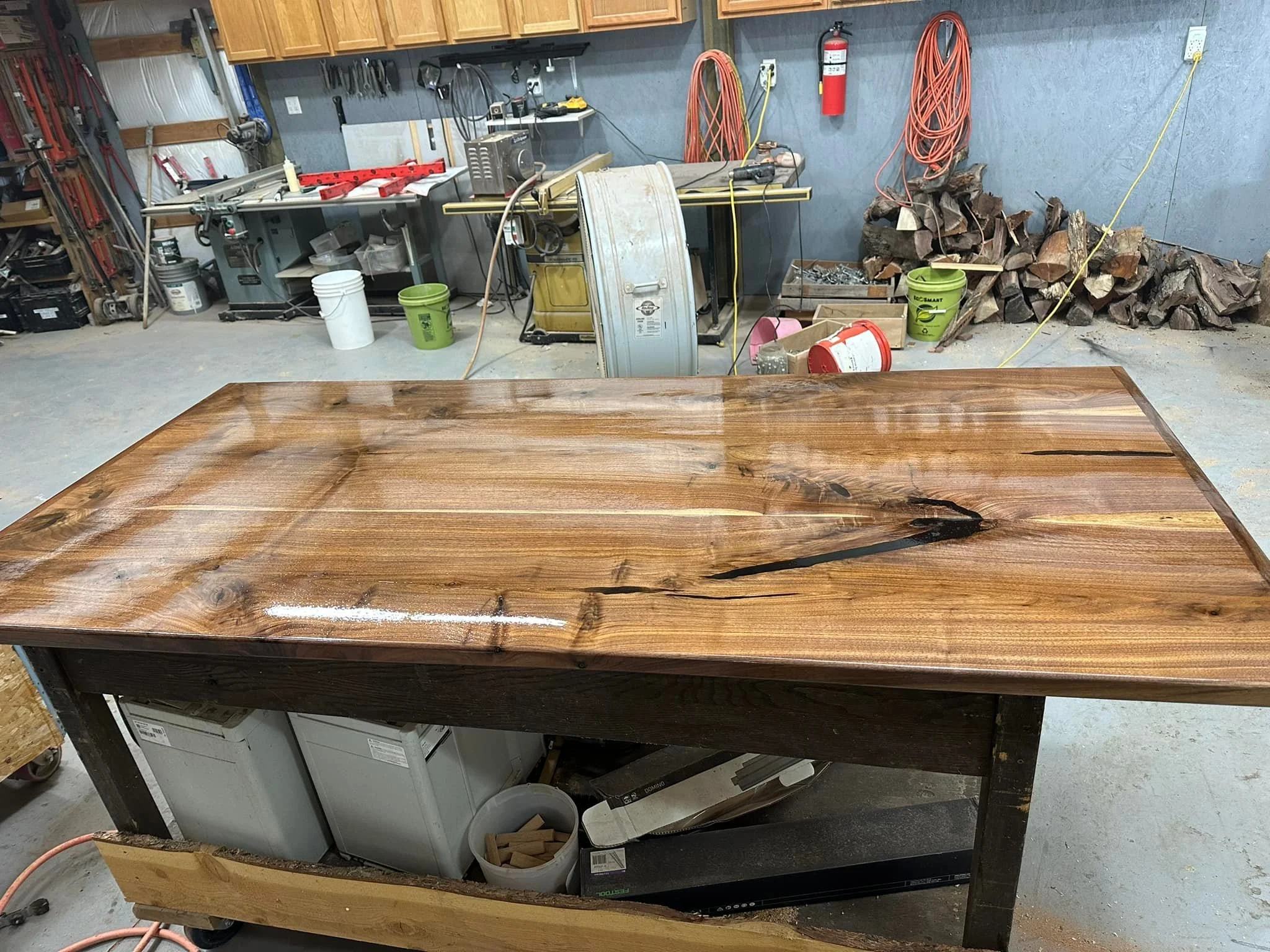 First coat of polyurethane on a walnut table