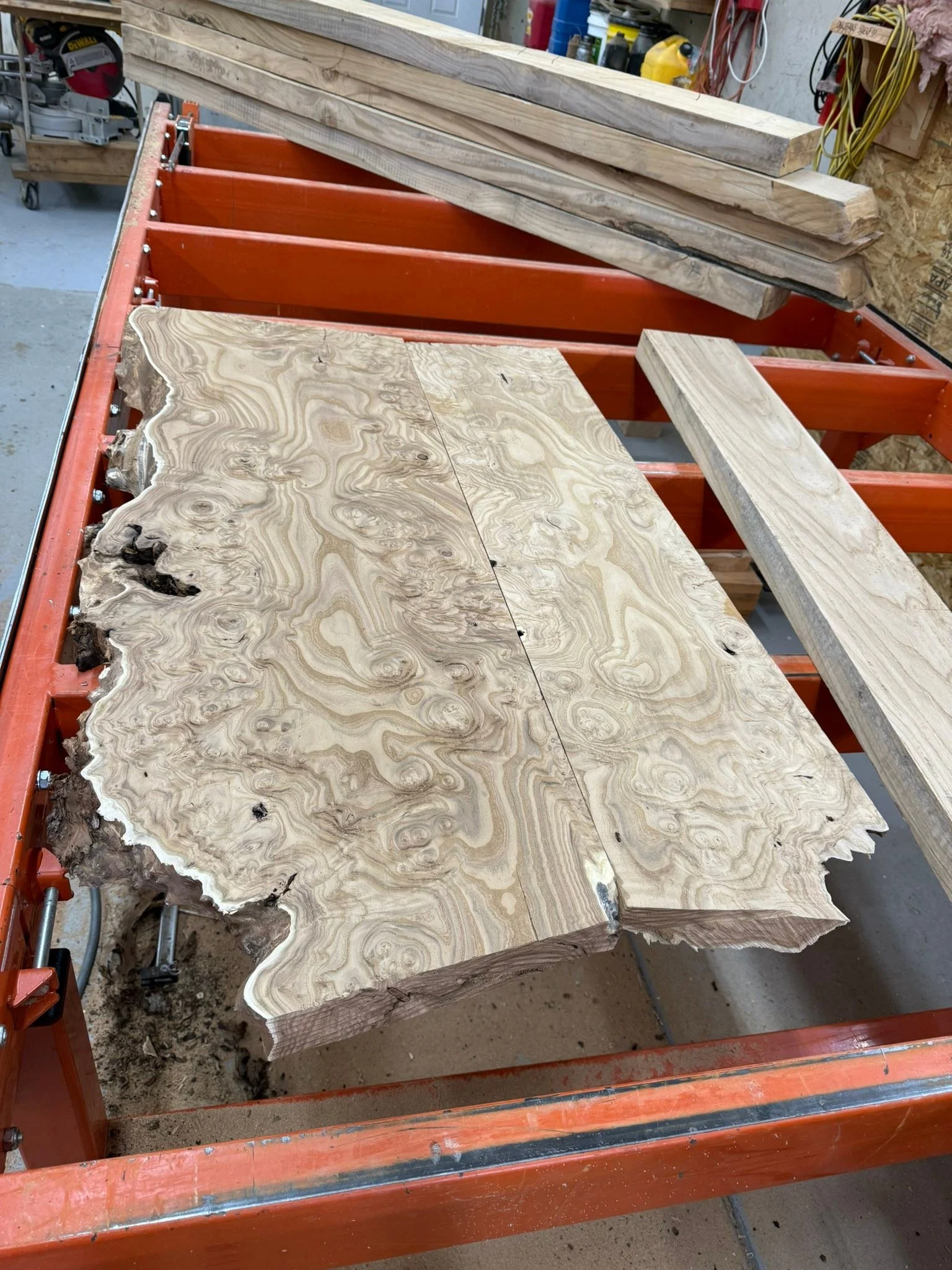 On deck is this book matched Russian olive vanity counter with an additional shelf. This should turn out stunning because of all of the burl in the Russian olive.