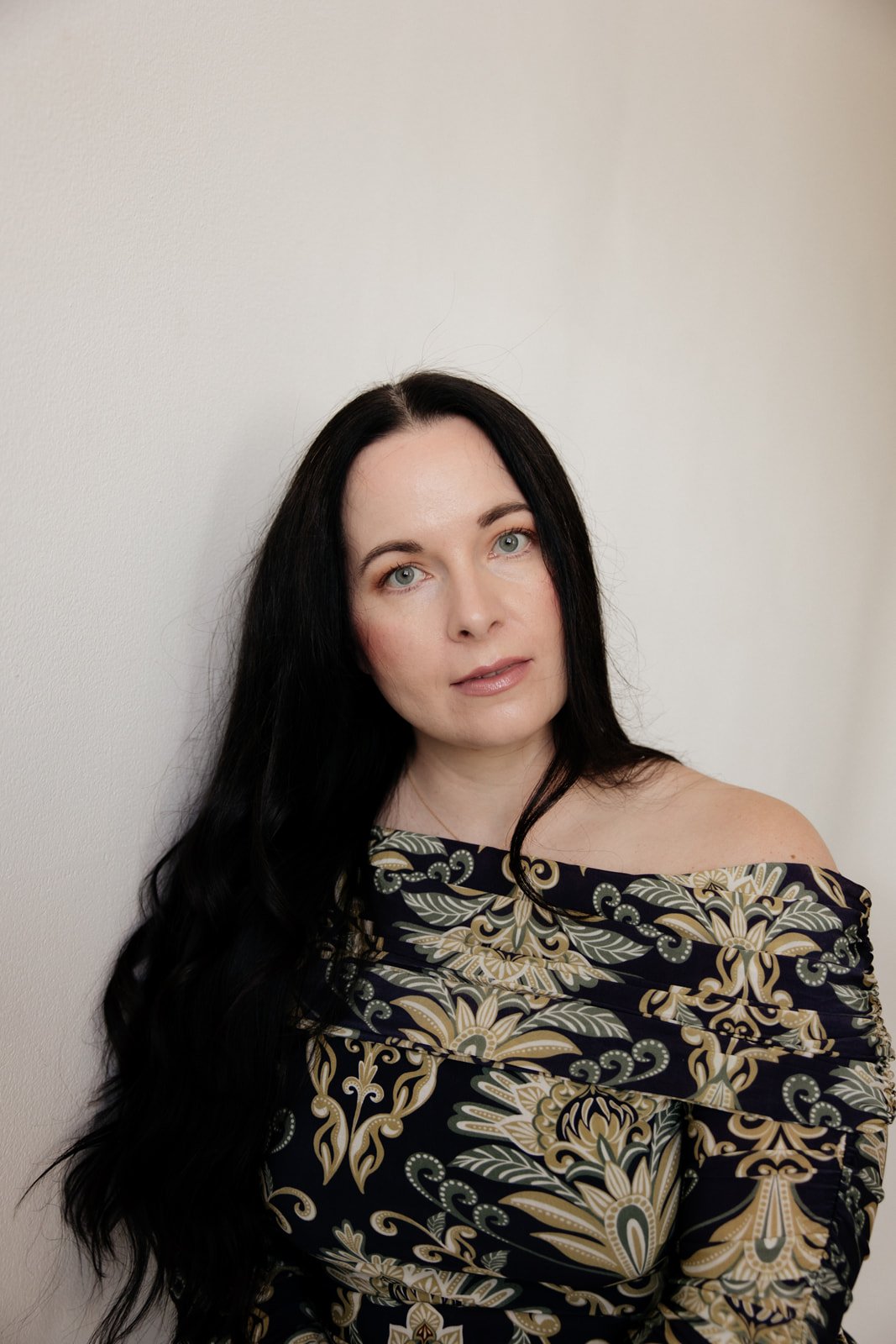 Sara Moon in reflective state, soft natural tones