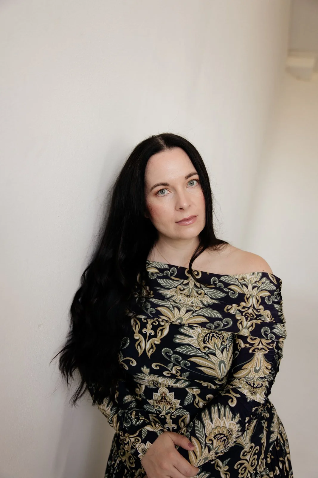 Sara Moon in reflective state, soft natural tones