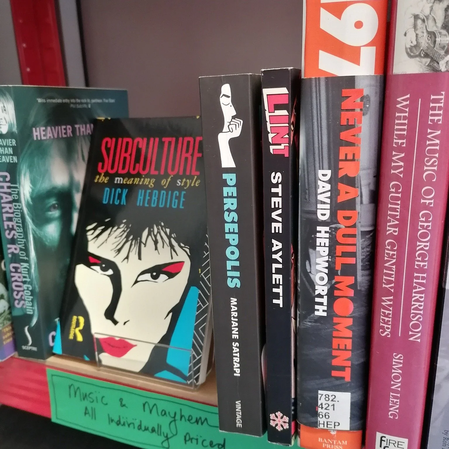 📣New Shelf Alert! (and a dolphin for no reason)

We have curated a new shelf filled with books on music, culture and mayhem! See we can squeeze more books in if we try!

We've had a chaotic and wonderful market Saturday but still have quite a few bo