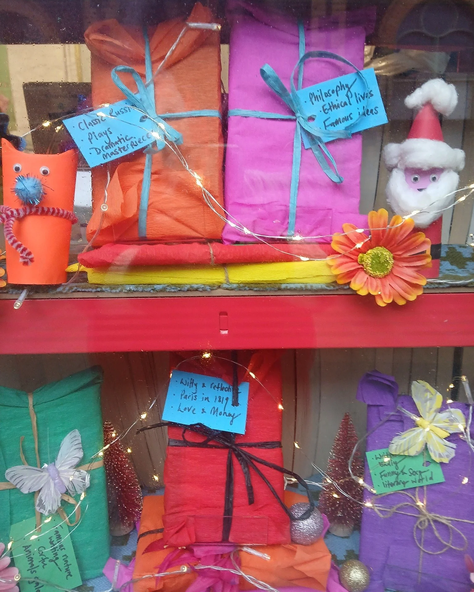 🎄✨🎄✨Book Garden Winter Wonderland!🎄✨🎄✨

The tree is up and the books are looking very well dressed in their Christmas finery. Come feast your eyes on our new window display, a book winter wonderland featuring our favourites -  Santa, Rudolf  and 