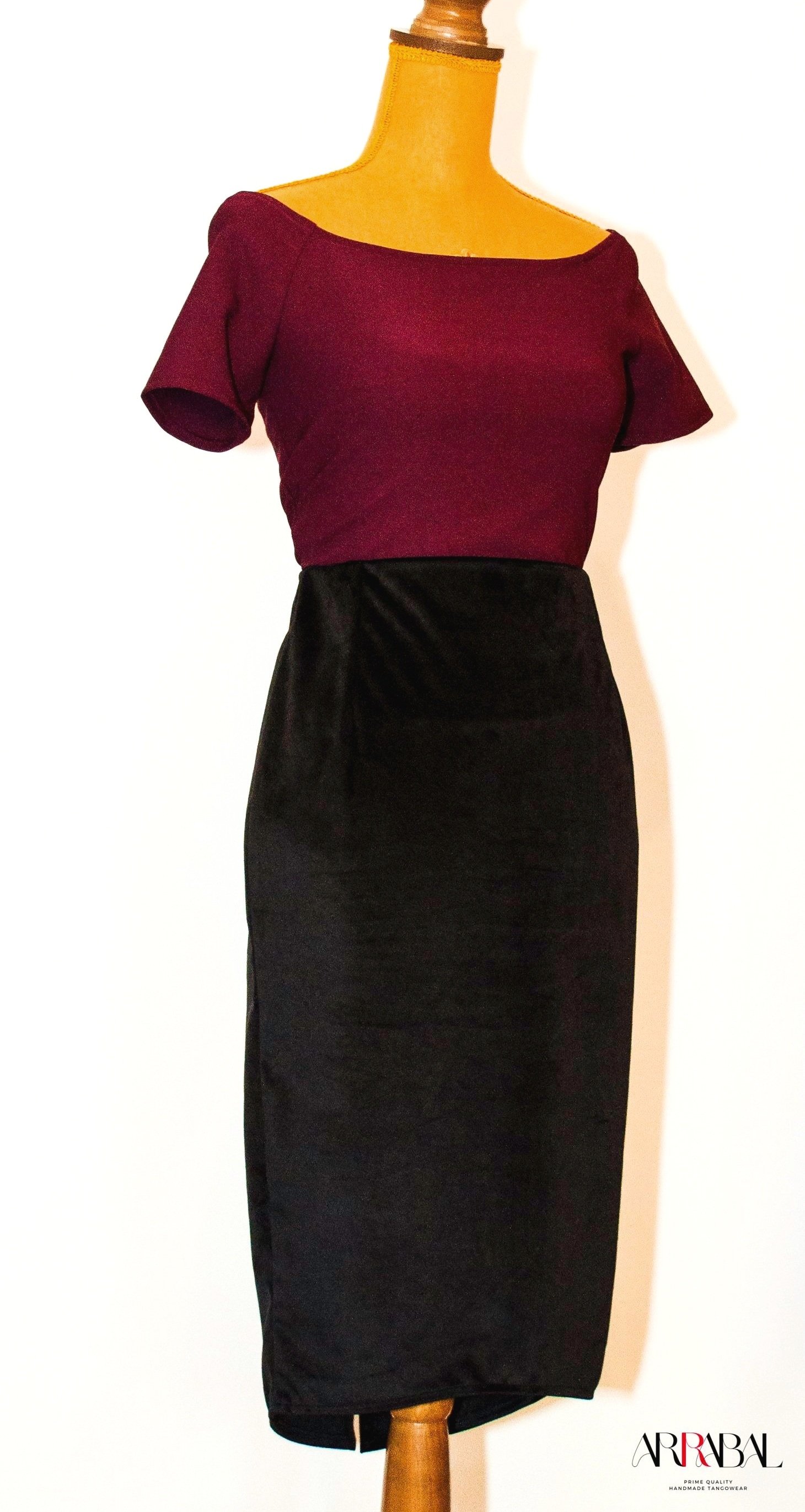 Shop our Black Velvet Tango Skirt, designed with a back slit and stretchable velvet fabric for ultimate comfort and style. Ideal for milongas and tango performances.