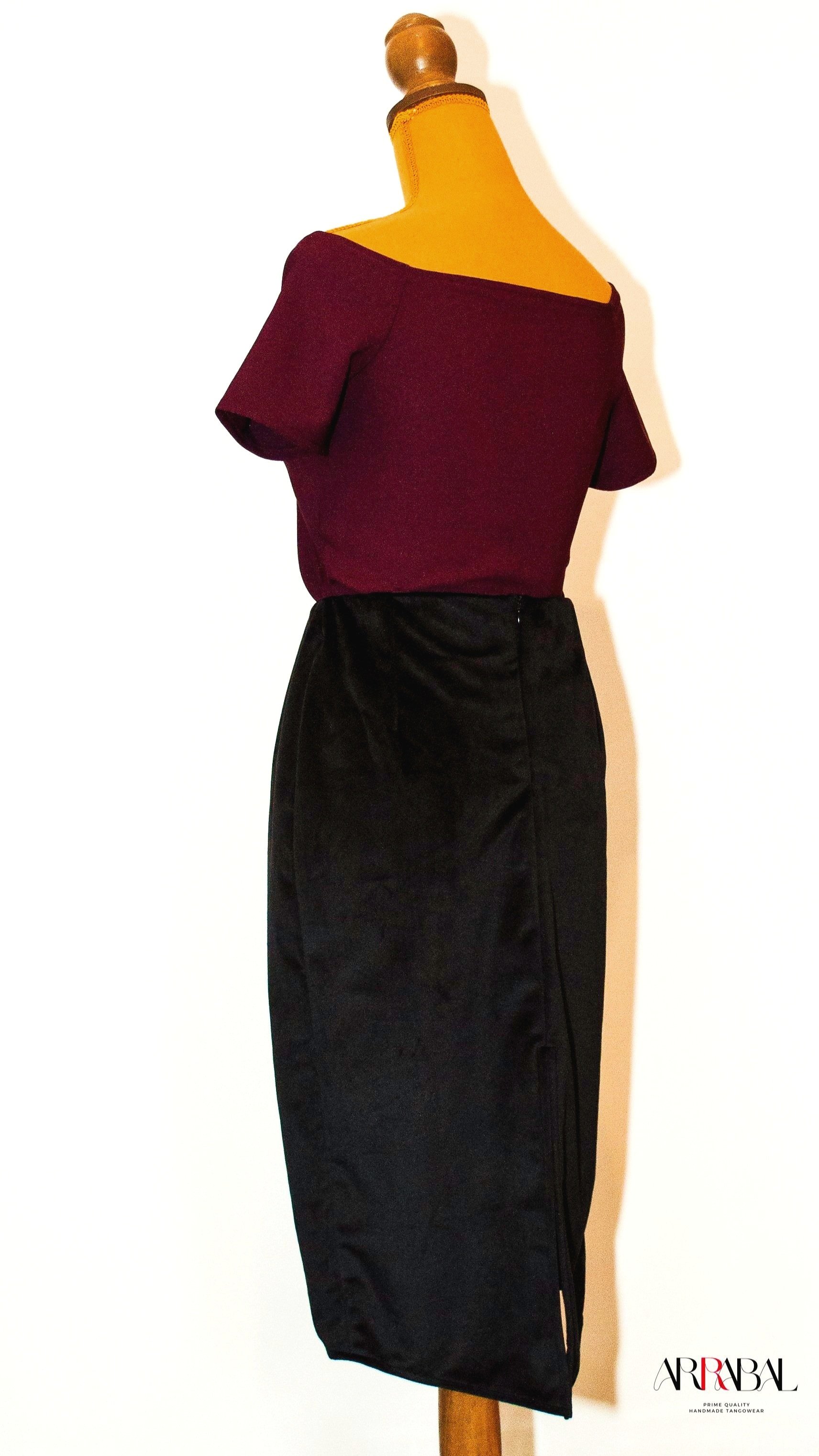 Shop our Black Velvet Tango Skirt, designed with a back slit and stretchable velvet fabric for ultimate comfort and style. Ideal for milongas and tango performances.