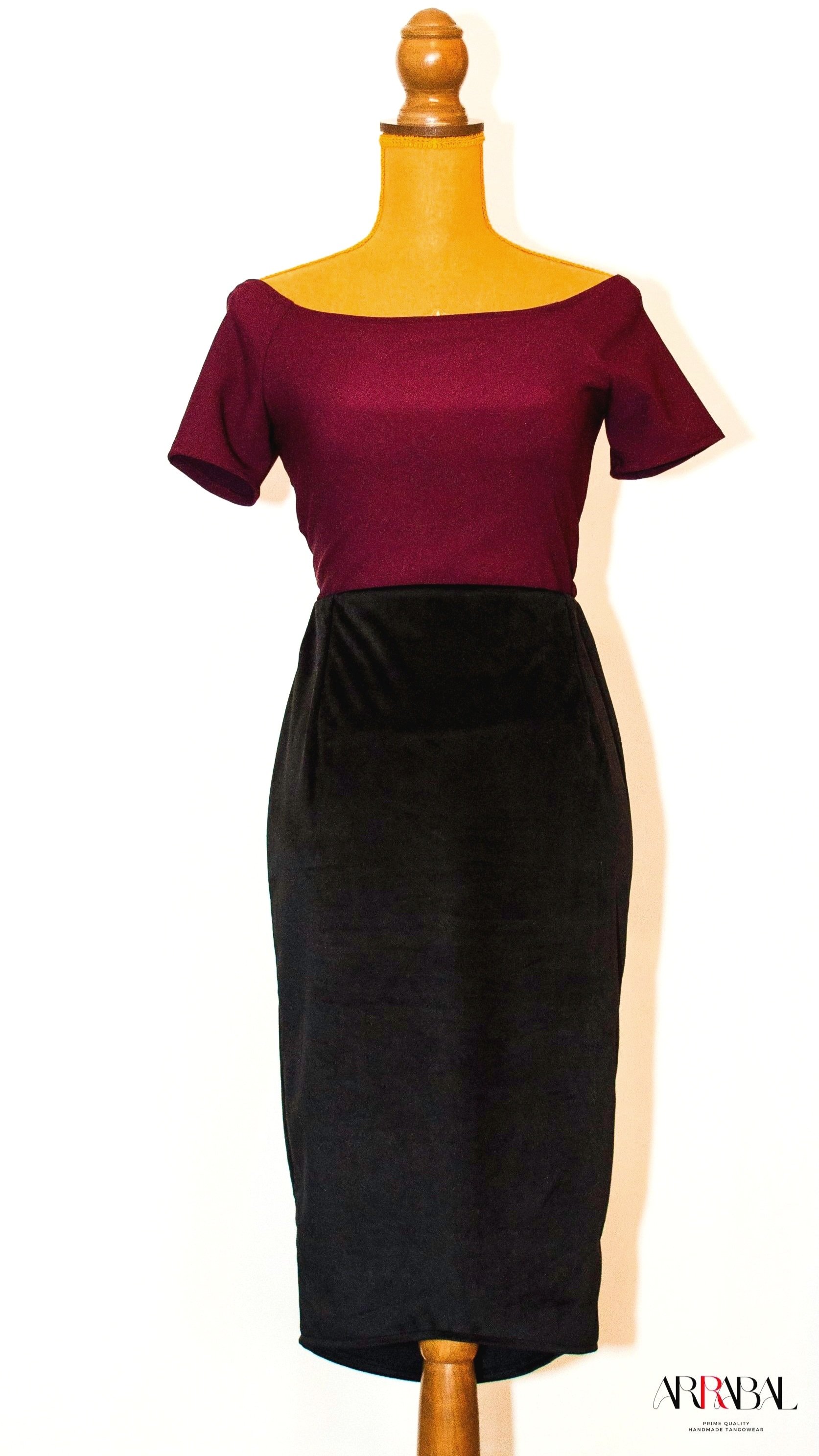 Shop our Black Velvet Tango Skirt, designed with a back slit and stretchable velvet fabric for ultimate comfort and style. Ideal for milongas and tango performances.