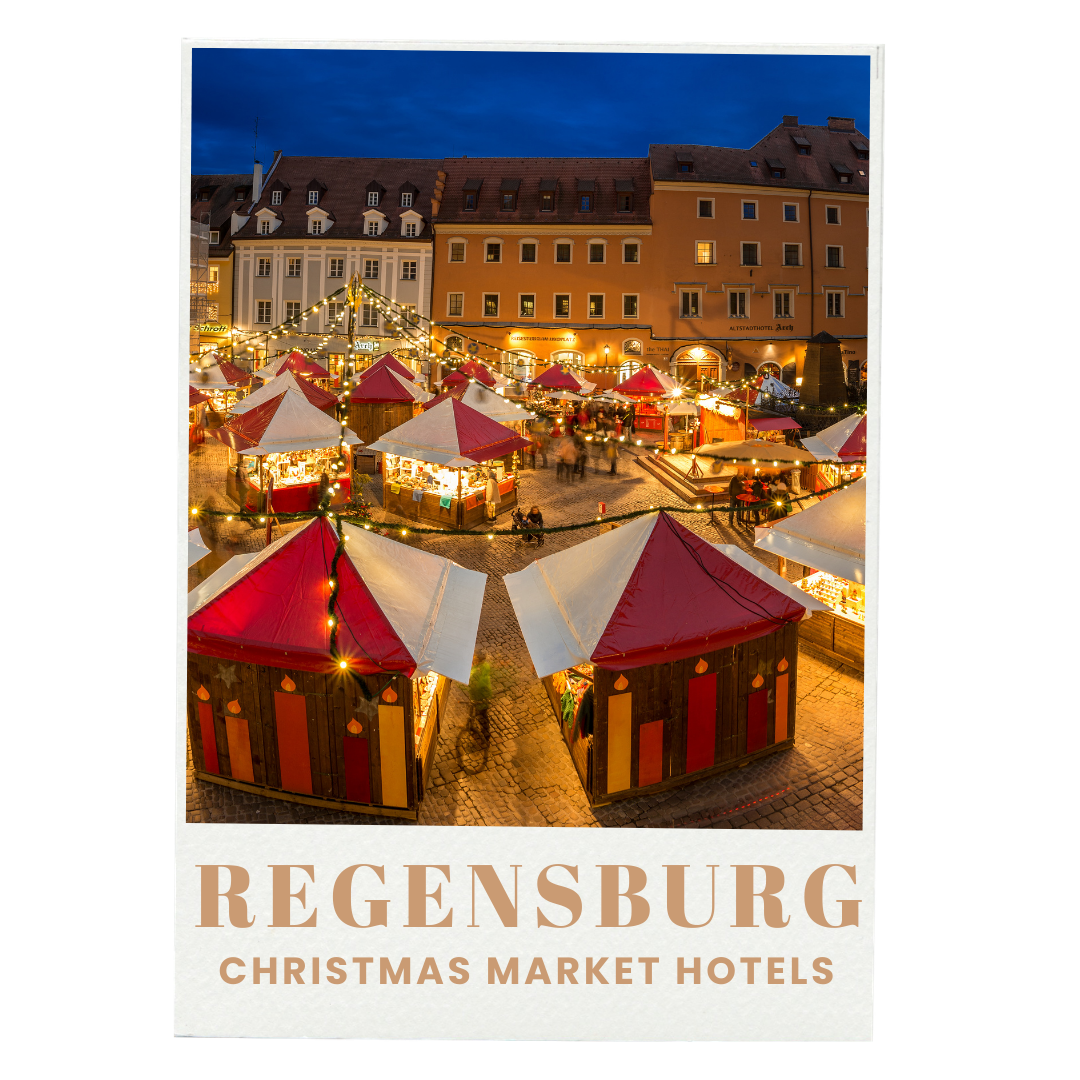 A festive Christmas market with wooden stalls with red and white striped roofs, illuminated with string lights, set in a European city square at dusk. Buildings with lit windows and a deep blue sky are in the background, with the text "REGENSBURG CHRISTMAS MARKET HOTELS" at the bottom.