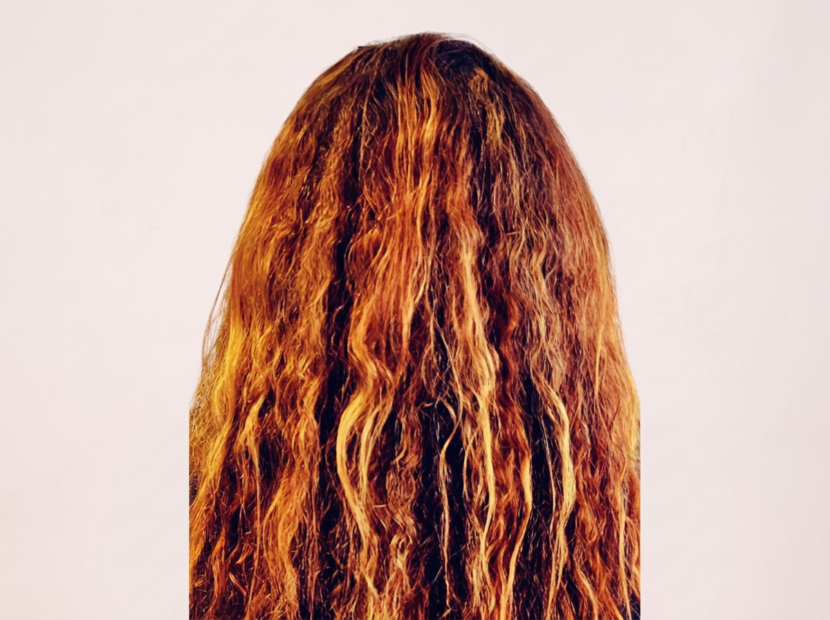 Wavy, curly hair before smoothing service