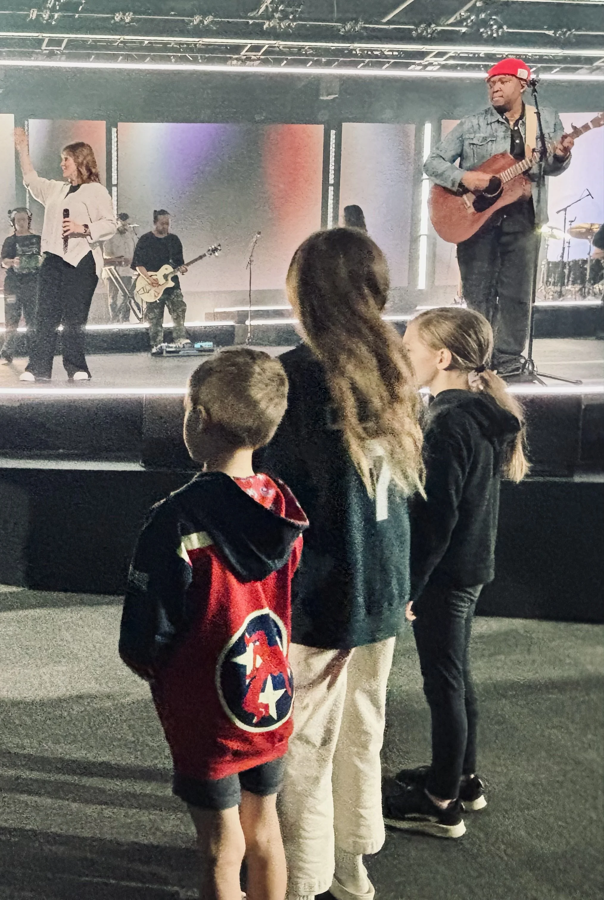 Collett kids watching Ash's baptism at TBCo