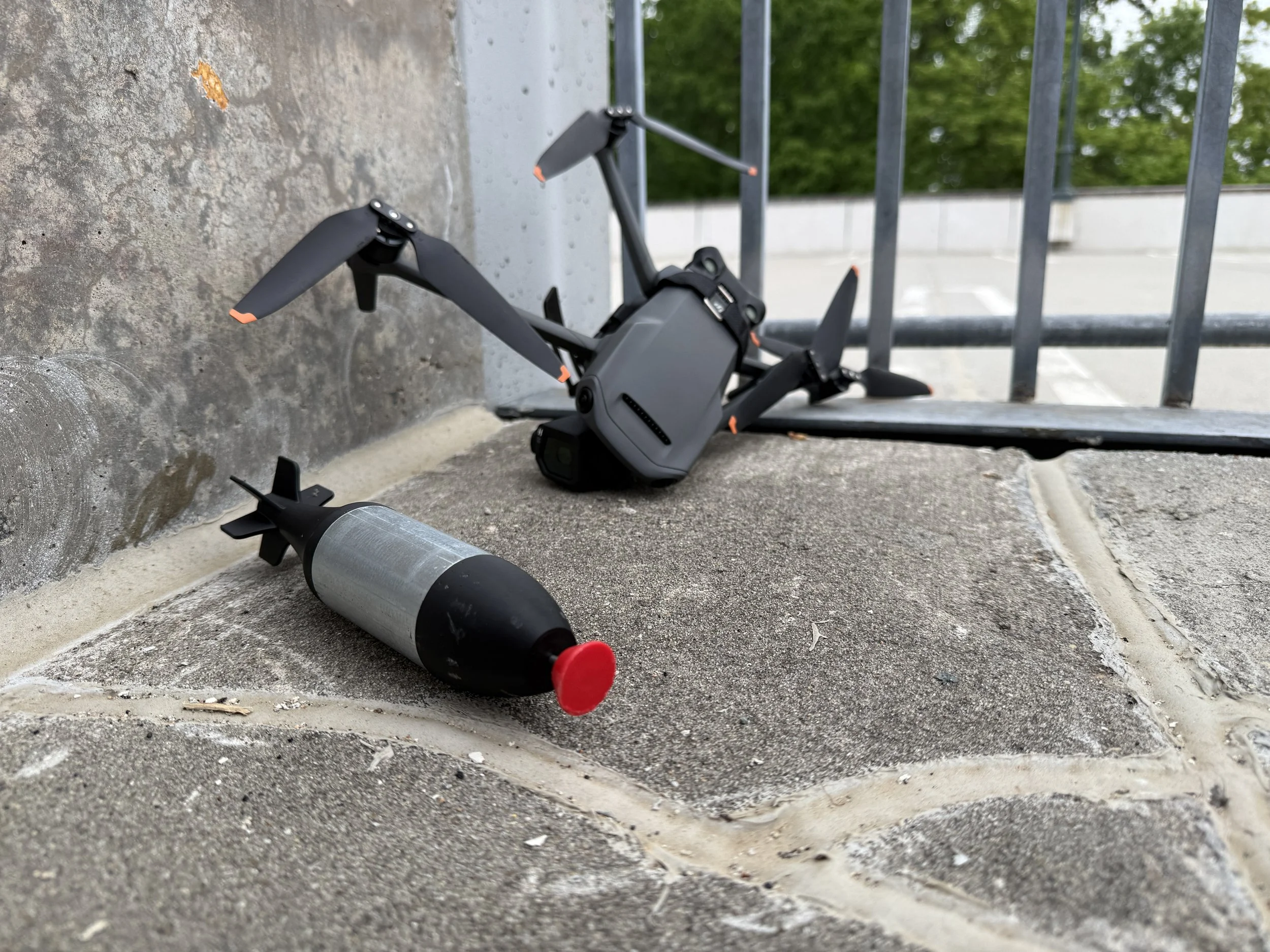 Drone IED lies near a crashed weaponized DJI Mavic during C-UAS DIRT course.