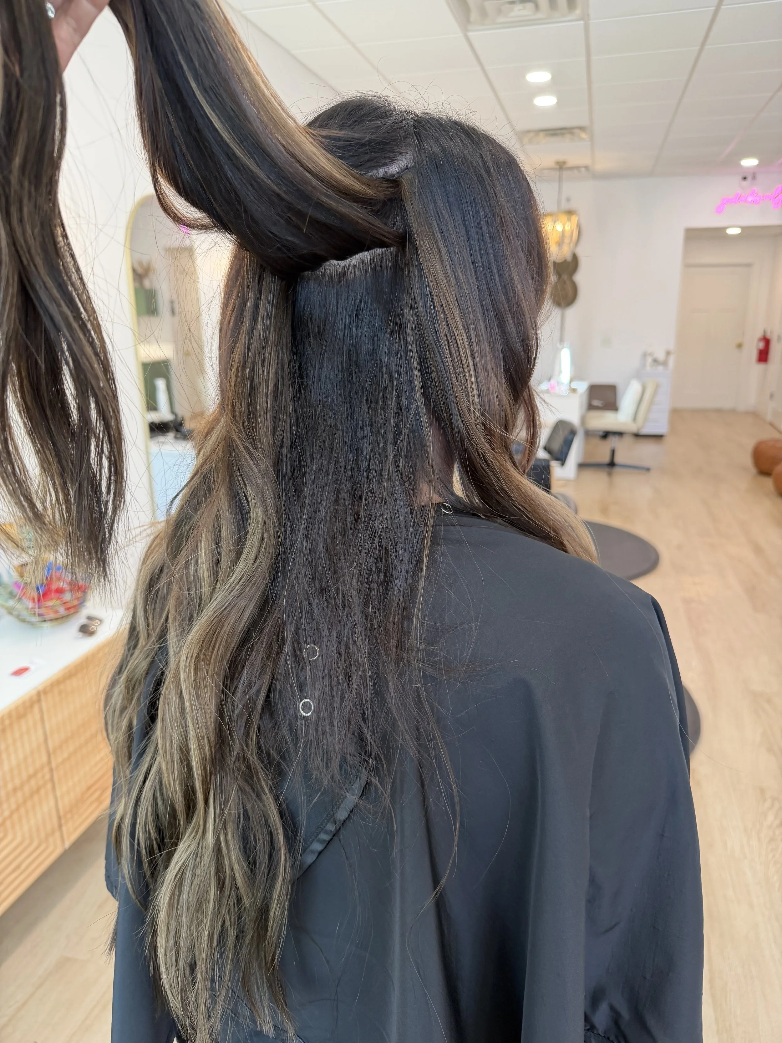 Brown Hair Client with Long Hair Extensions.