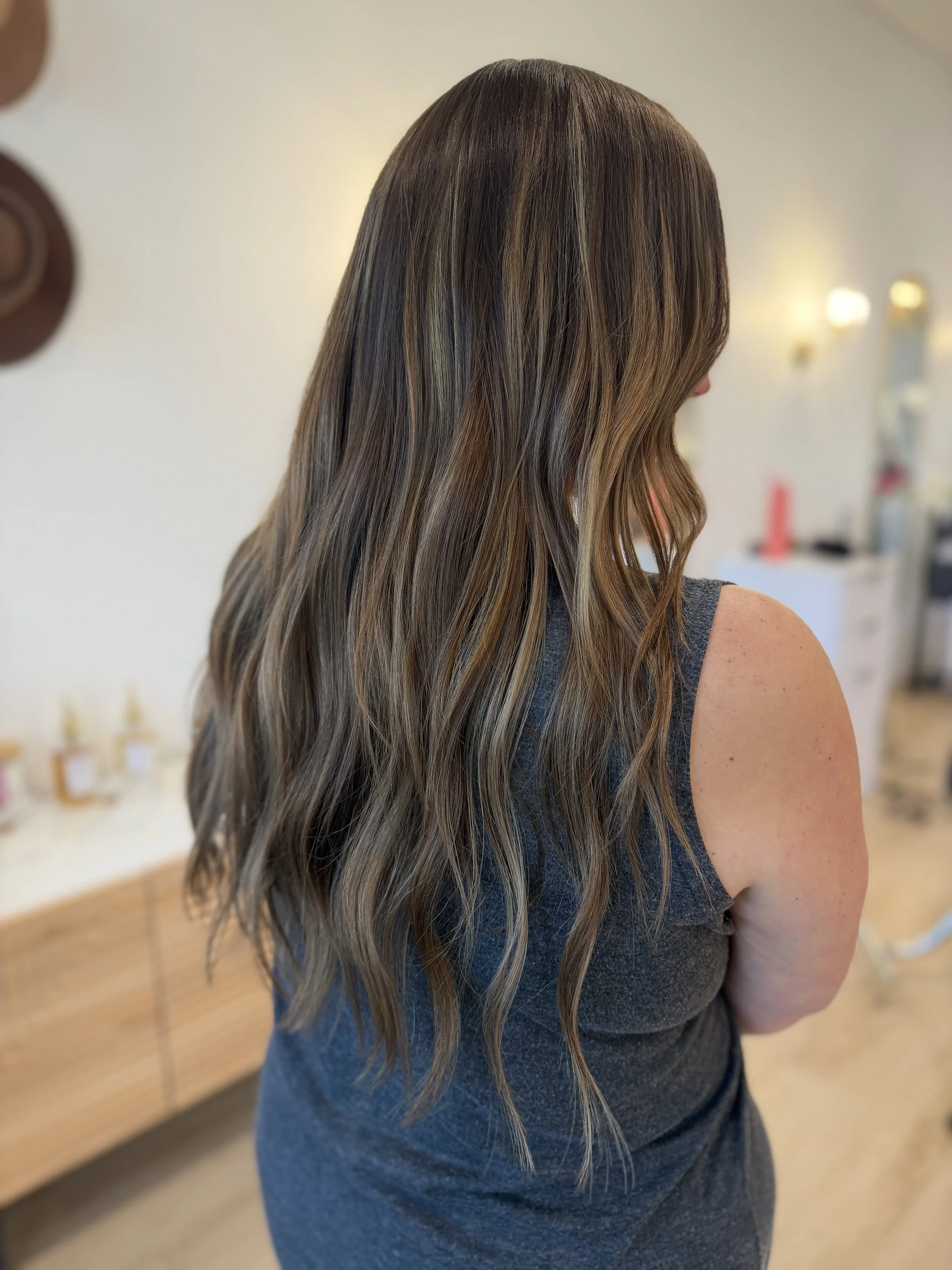 Long Brown, Highlighted Hair with Long Hair Extensions.