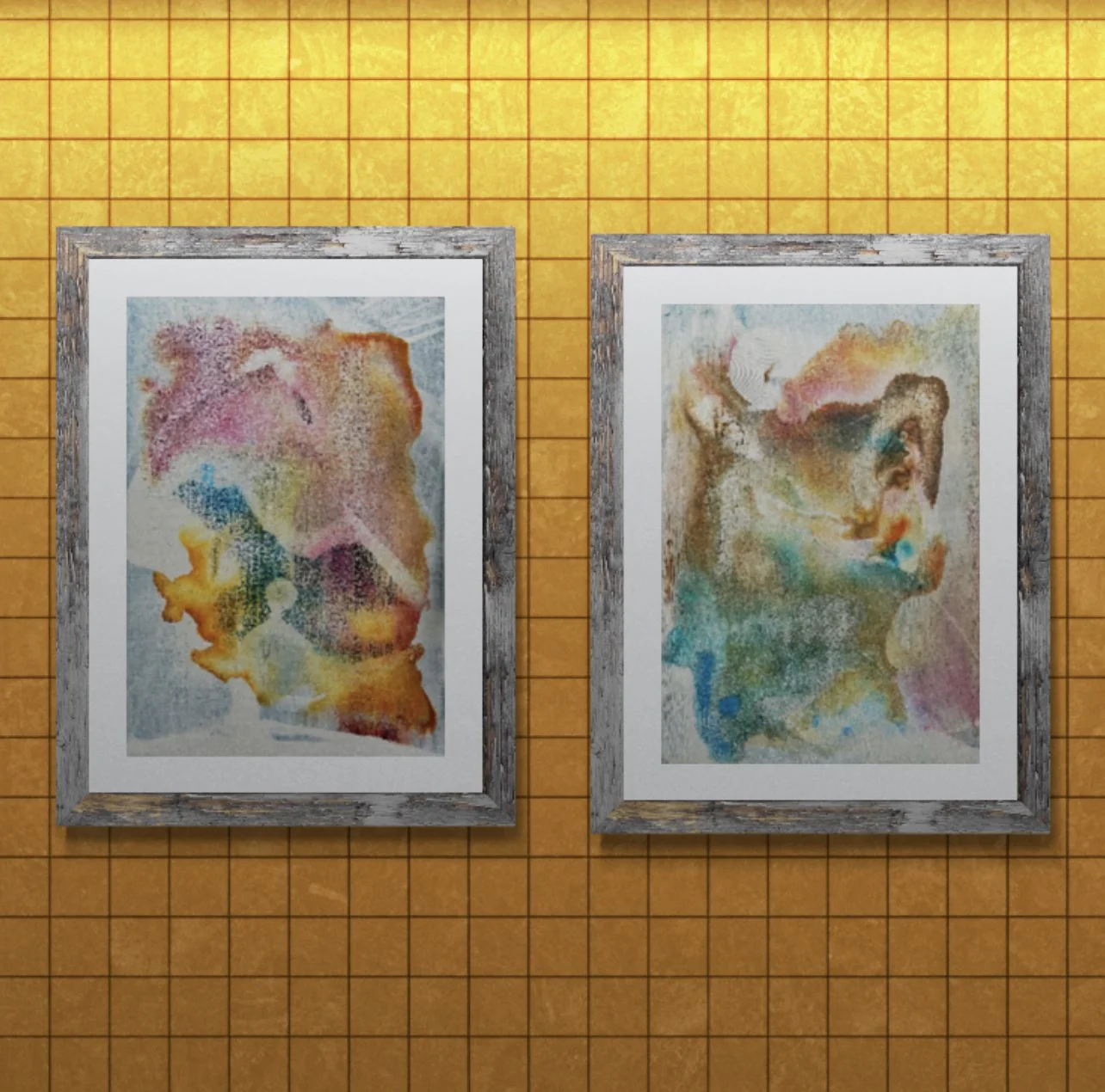 Two abstract watercolor paintings in wooden frames hung on a yellow grid-patterned wall.