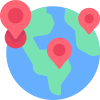 A globe with four location markers in pink and red on different parts of the world map.
