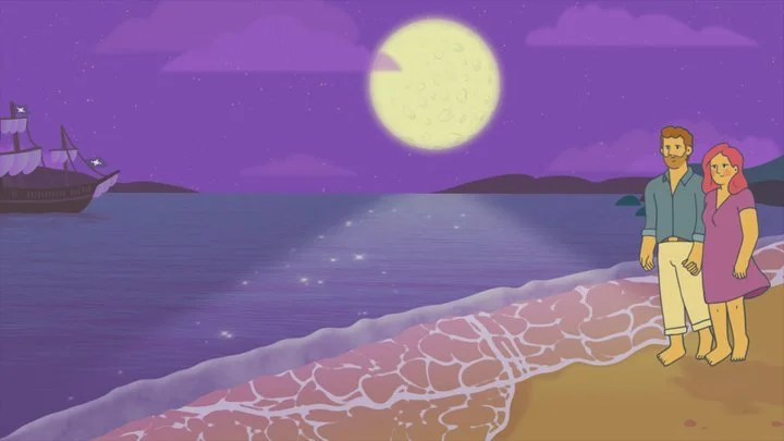 A couple walking on the beach under a full moon at night with a ship in the water and mountains in the background.