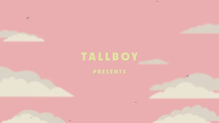 Pink background with white clouds and the text "TALLBOY PRESENTS" in yellow