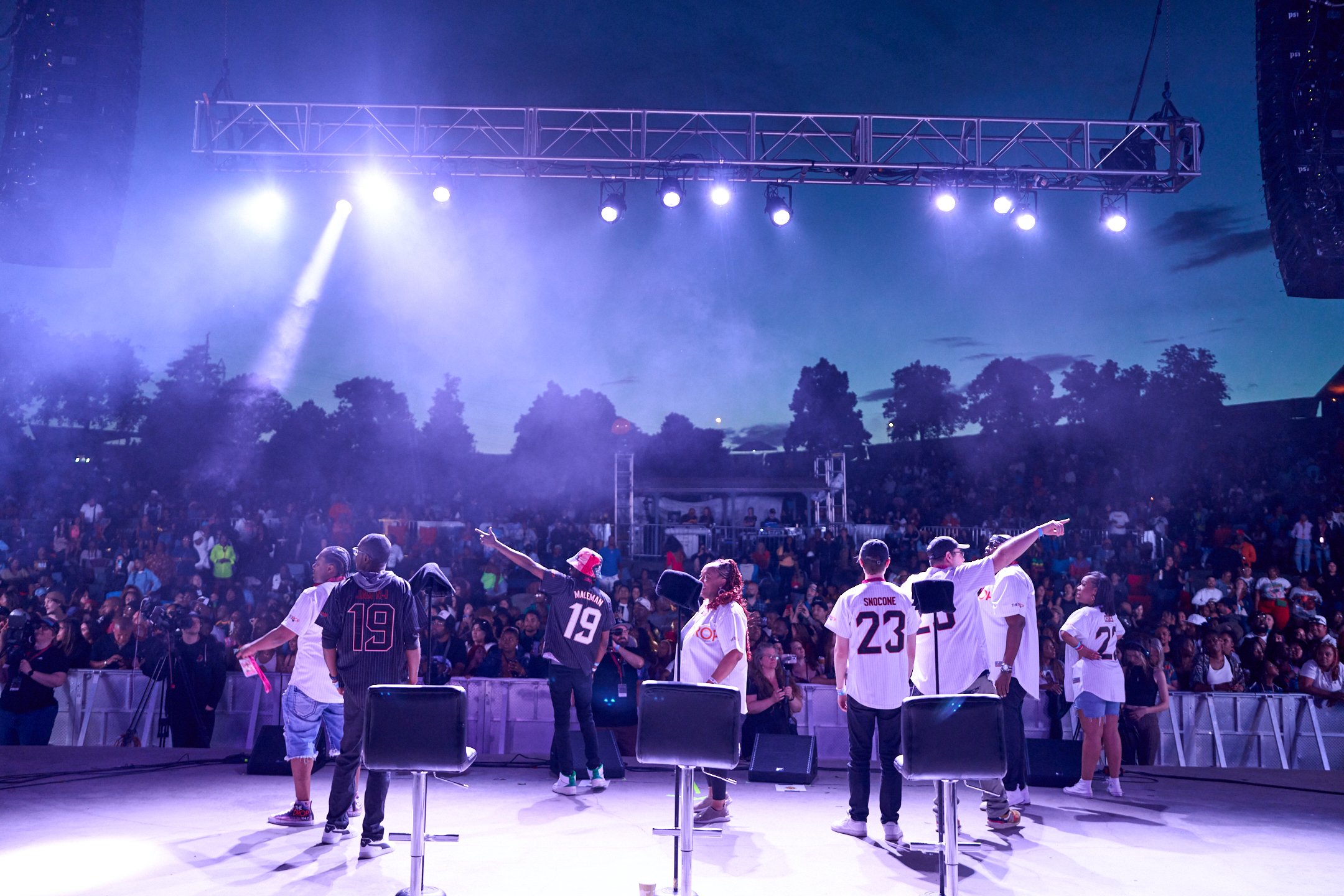 Staff from Rocky Mountain Public Media's The Drop pump up the audience at their annual Block Party in Denver, Colorado (Credit: Bryan Swarn)