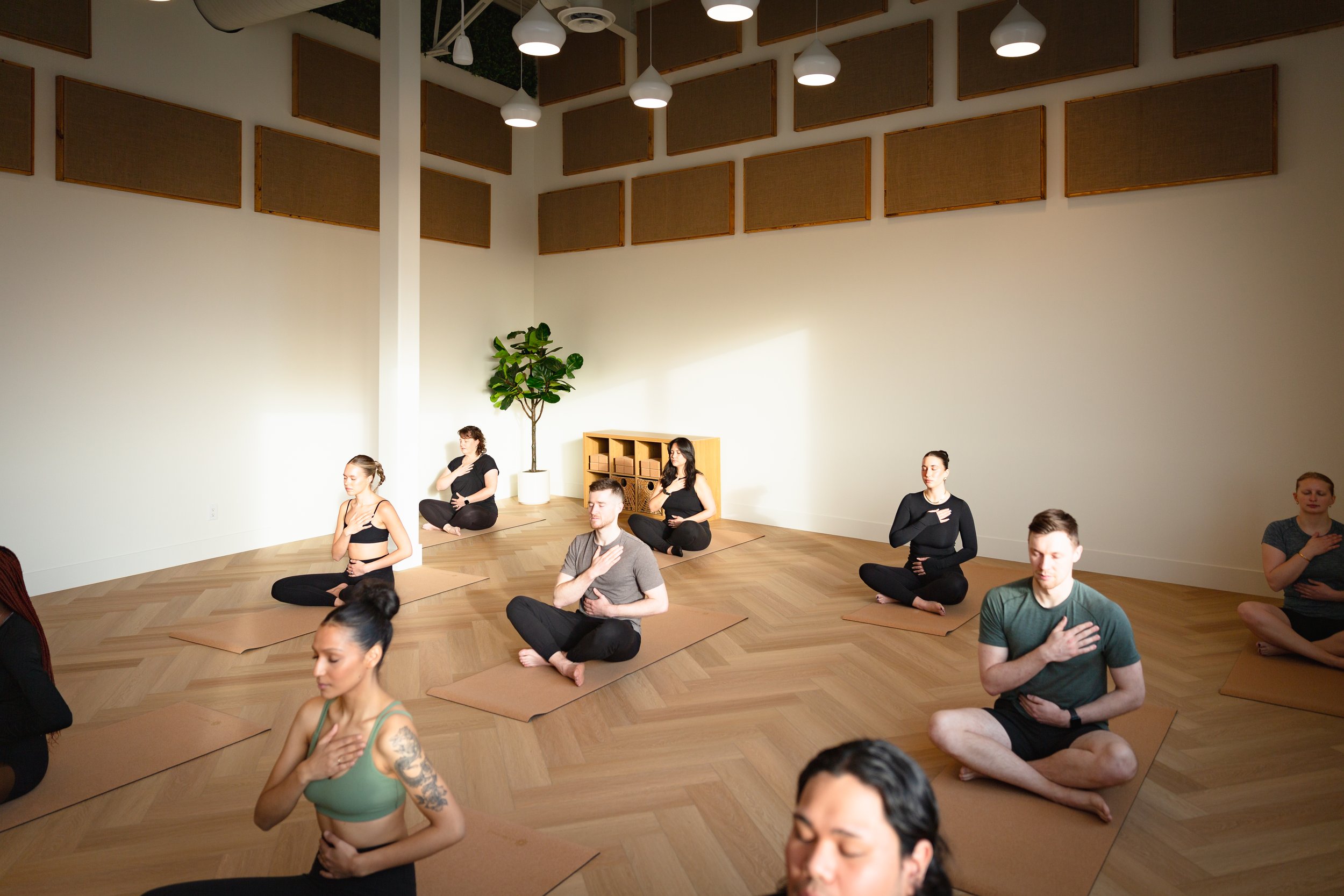 Serene and spacious yoga practice area at PŌZEN Yoga studio in Calgary
