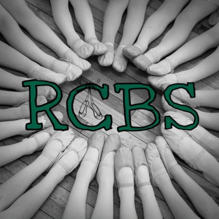 Children's feet arranged in a circle around the letters 'RCBS' with a drawing of a fishing hook in the background.