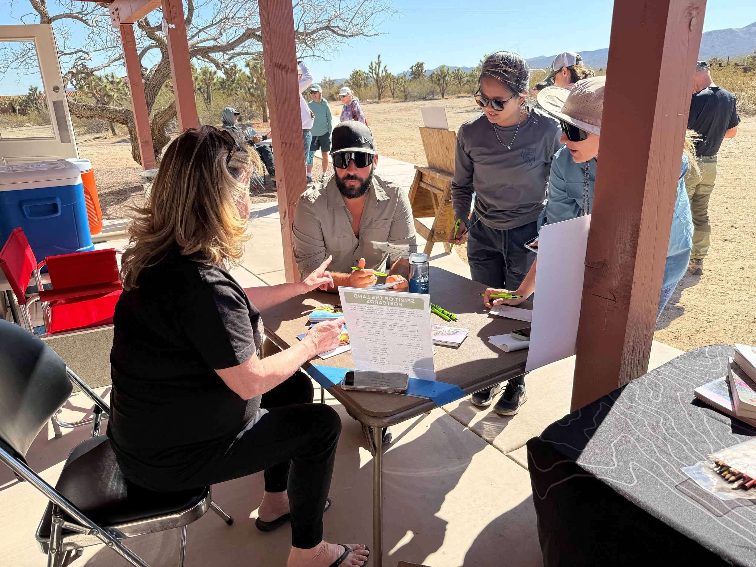 Participants writing postcards to elected officials.JPG