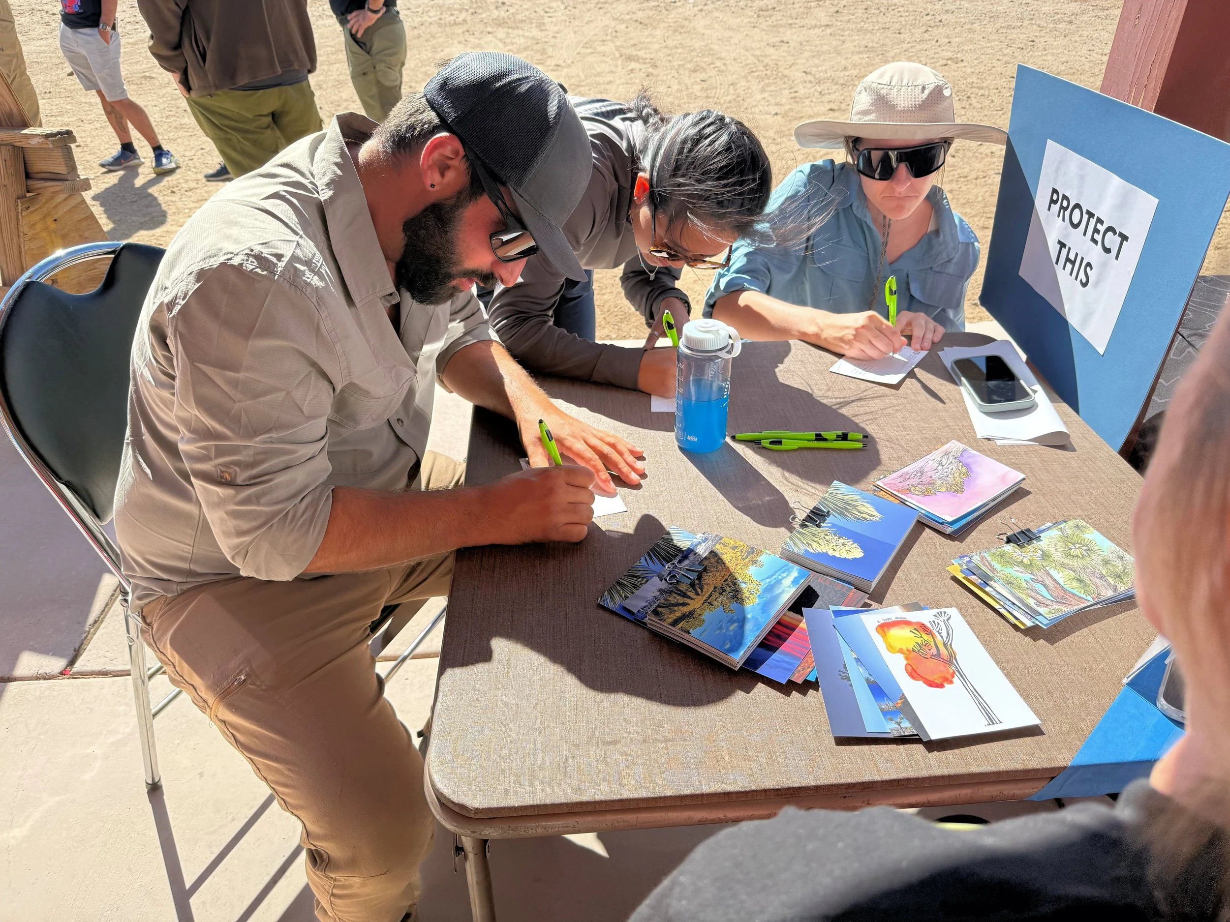 Participants writing postcards to elected officials  (2).JPG