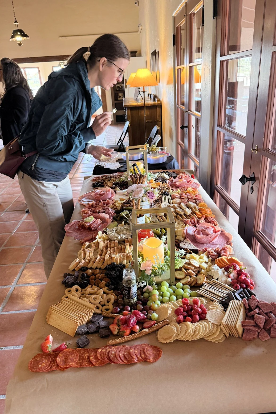 Nattaly selecting soem goodies from the UNLV spread.jpg