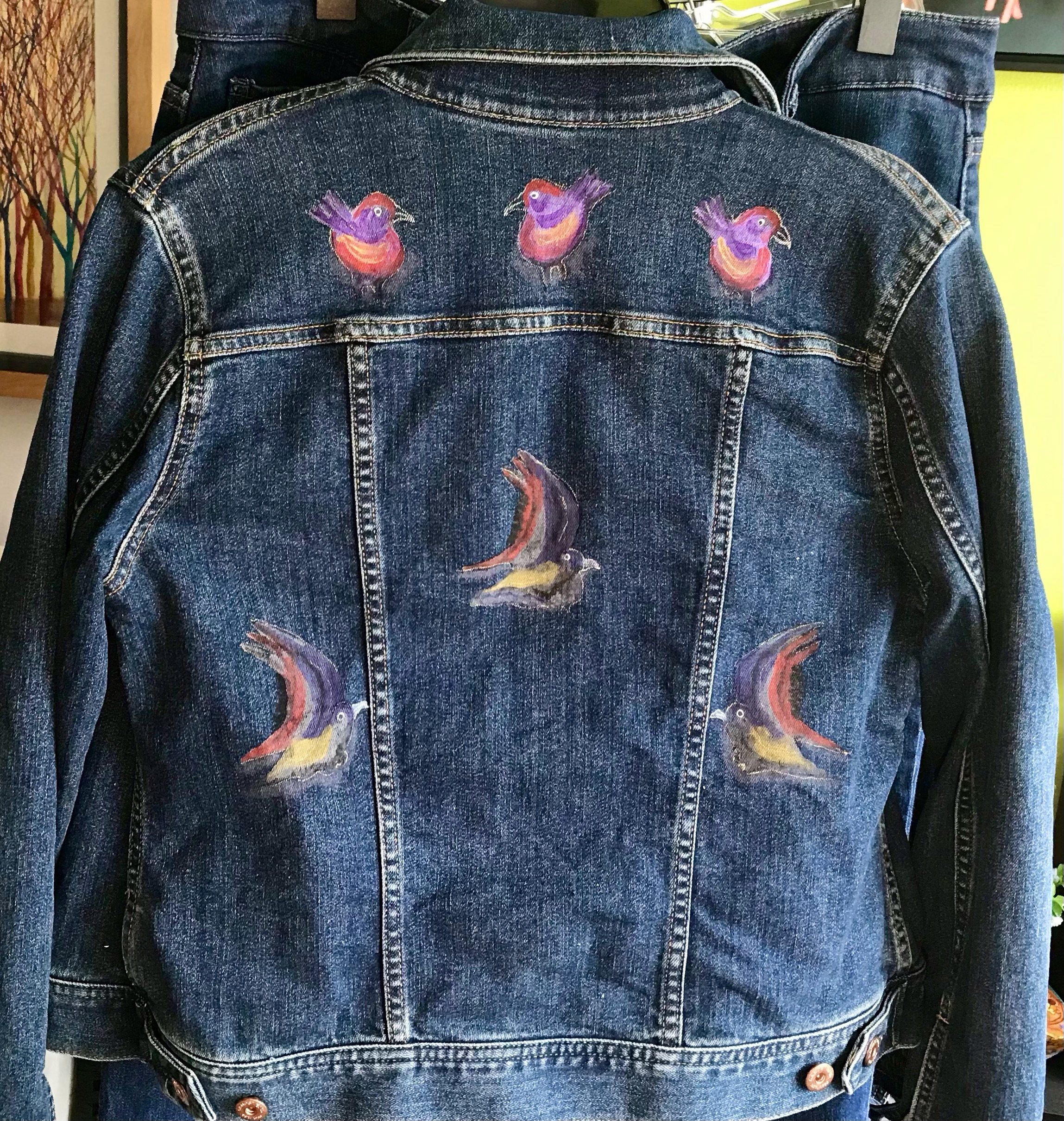 hand-painted-jean-jacket-with-multi-color-birds.jpeg