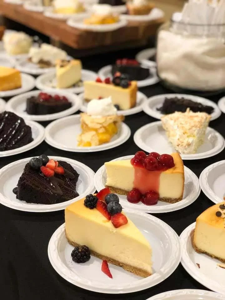 Wedding guests enjoying a catered dinner reception in Cedar Rapids, Iowa.