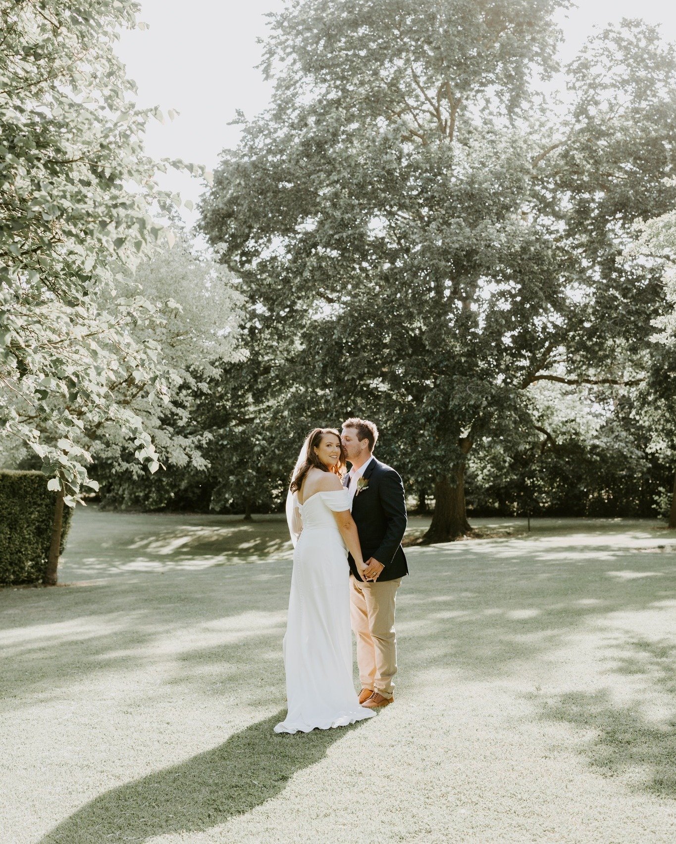 Stillness, sunlight, and a quiet moment in the Homestead gardens, soaking it all in &mdash; sun on their faces, hearts full, and the sweetest realisation&hellip;

&quot;We're officially husband &amp; wife&quot;

Abbey &amp; Nathan photographed by @li