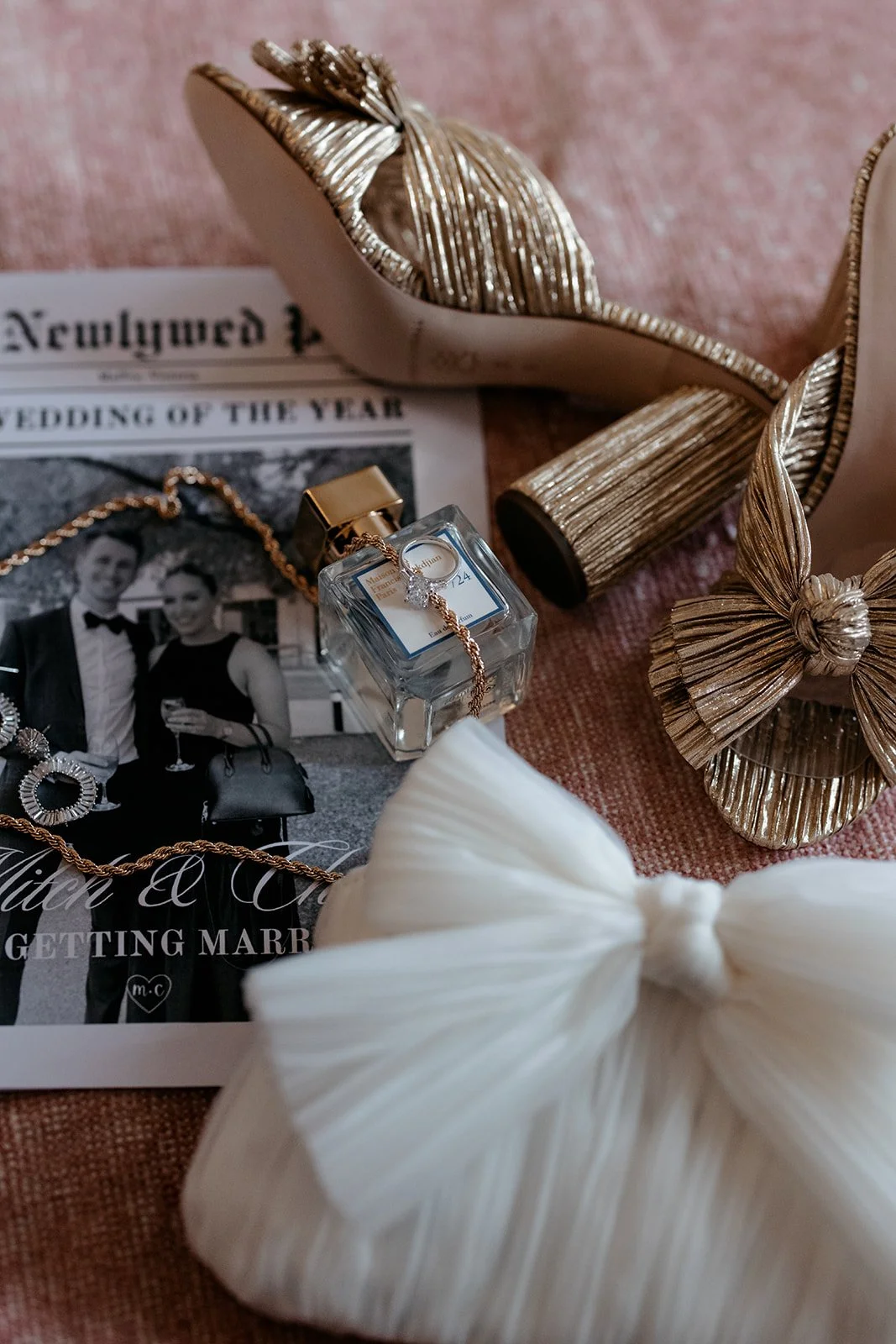 Serving Hollywood glam with a VIP twist. 

Chloe's golden shoes, the wedding magazine moment, and *the cutest* clutch&mdash;it's all giving red-carpet-ready bride vibes.

As always, @kristybykinship captures the gorgeous little moments. For Chloe &am