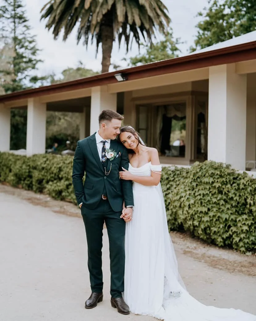 Phoebe and Michael look picture perfect in front of the old homestead ✨

Can we just give it up for Michael rocking this emerald green suit?

Photographer &amp; Videographer: @chamorecreations
Dress: @luvbridal
Suit: @suits_vibes
Hair: @theheadboutiq