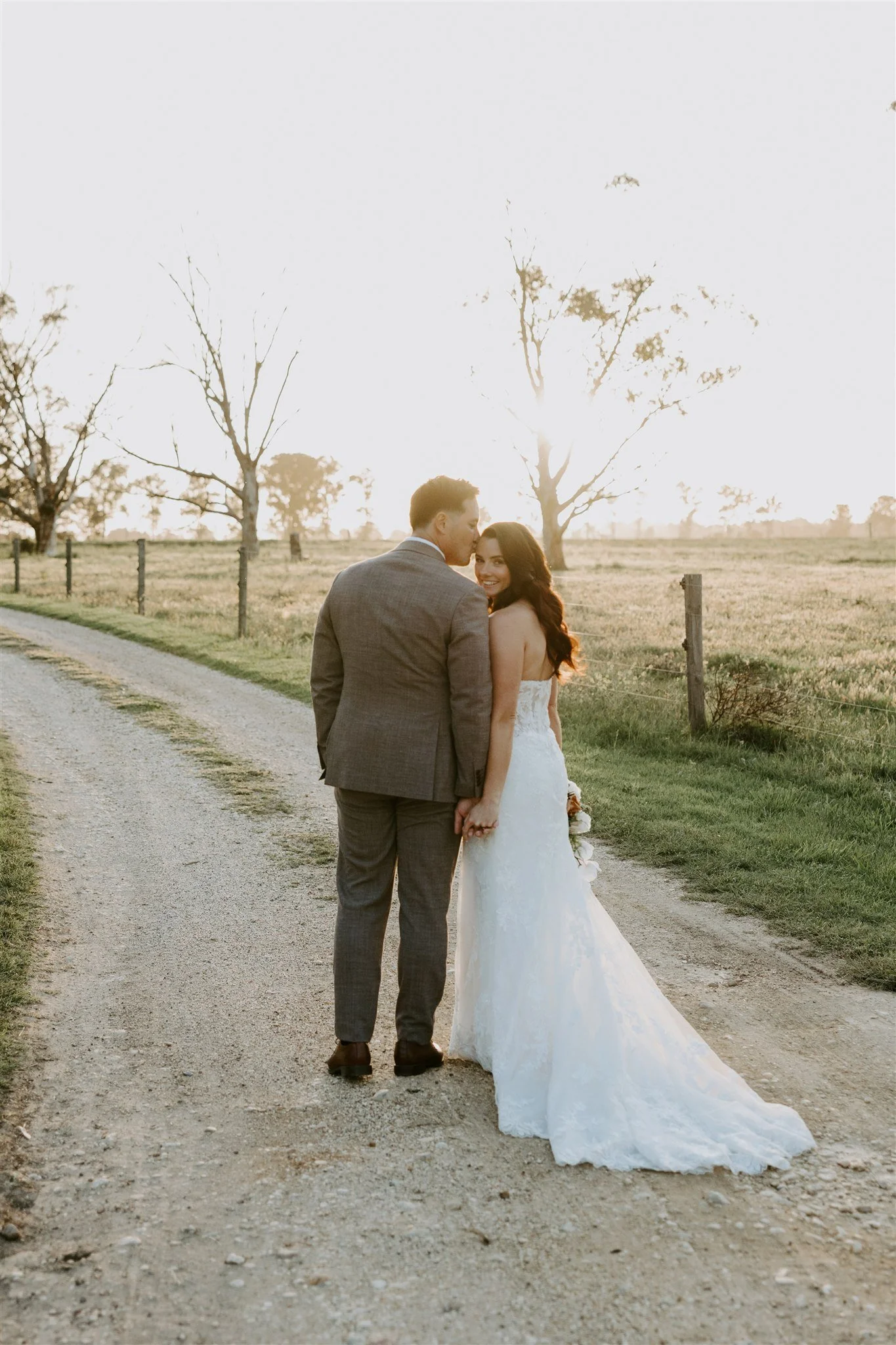 When nature sets the scene, the light turns golden, and the countryside becomes the perfect backdrop for your sunset photos.

Rebecca &amp; David wanted a gorgeous countryside wedding where "farm charm" meets a bit of luxe and what a moment
