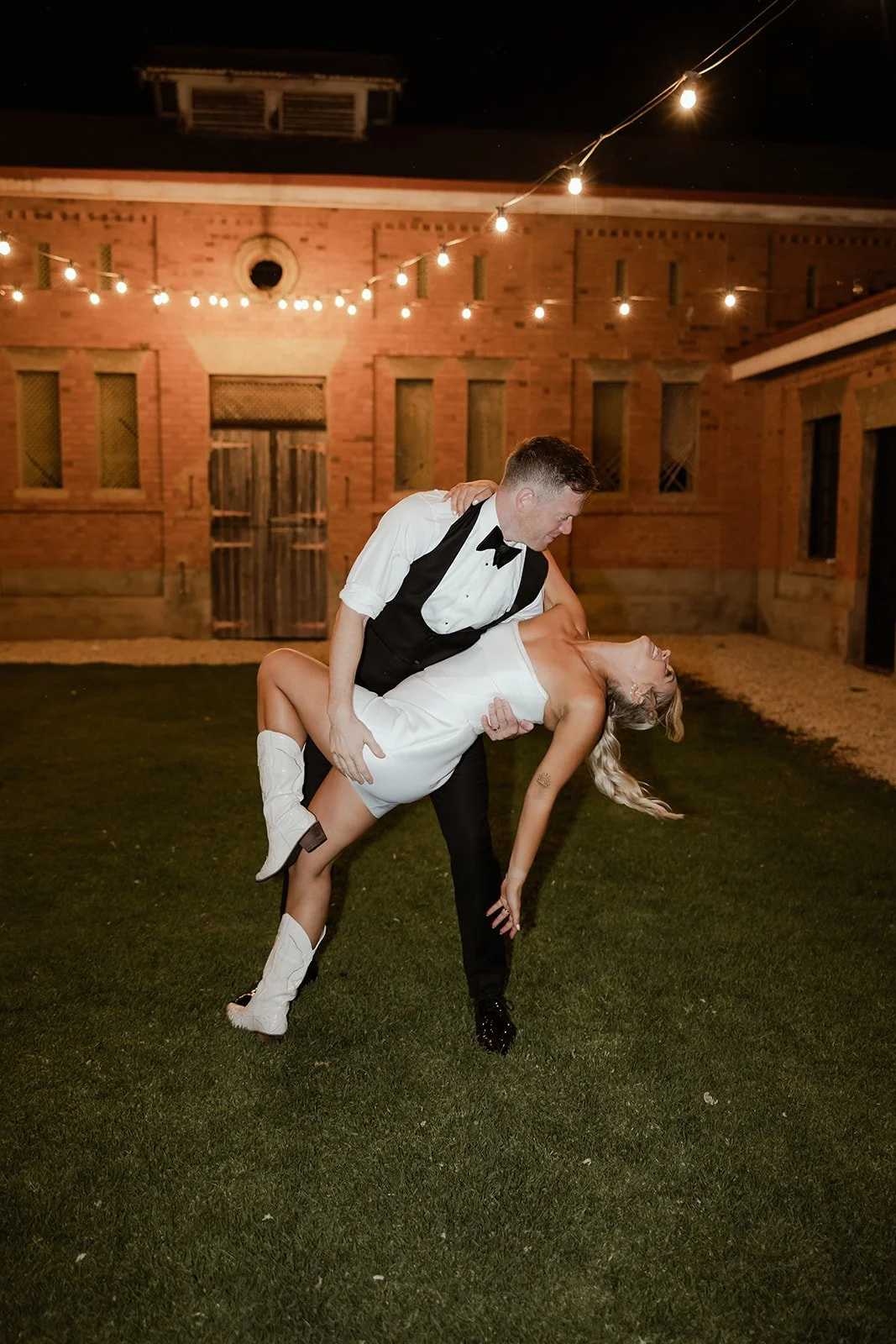 Fiona &amp; Bern and their perfect midnight dance at the iconic stables! Also, what a cool outfit change to mini dress and cowgirl boots 🤩

Photographer: @dustandsaltphotography
Dress: @kyhastudios
Suit: @menzclub
Hair: @schairartistry
Make up: @ell