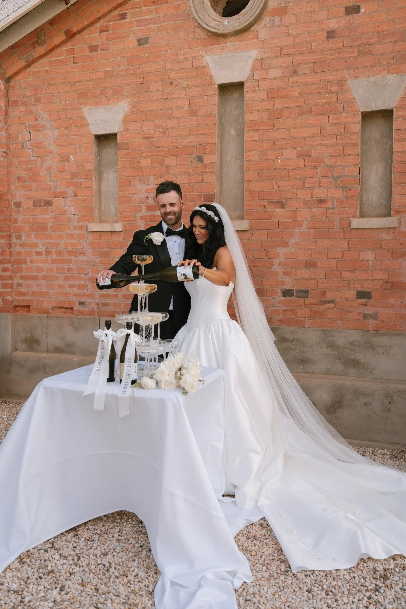 The Stables have never looked so fancy, Champagne Tower and a stunning couple in front of the old bricks - et voila ✨🥂🍾

Photo by @soulmate.weddings
Flowers by @champagne.electric
Dress from @raffaelaciucabridal
Suit from @peterjacksonau

#champagn