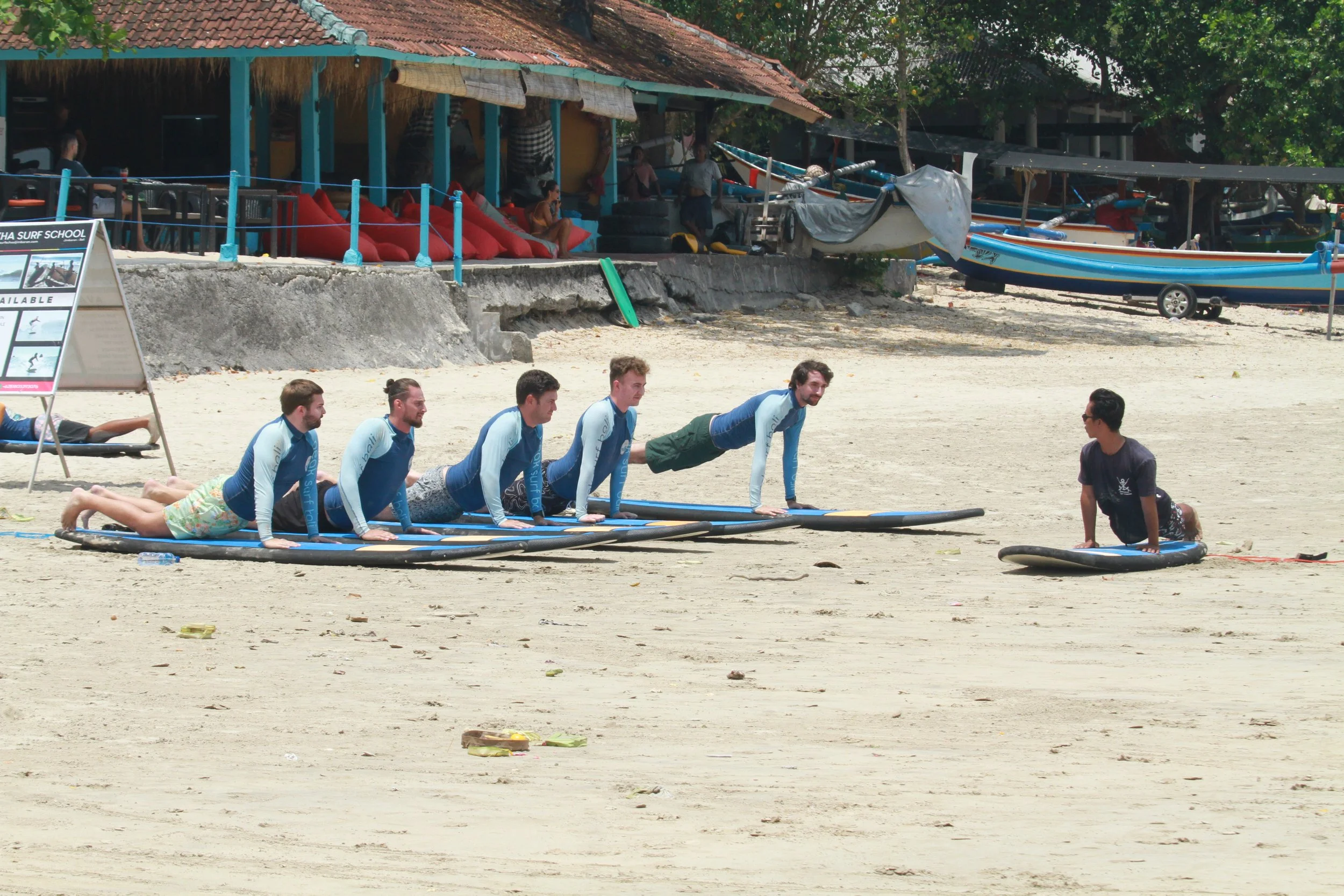 Group of Surf Students Solana Peak Surf Bali x After Break Point at Jimbaran Beach! @solana @solanabreakpoint peak surf school bali happy joy friendhip students riding waves at Jimbaran Uluwatu White sand crystal blue water clear water Peak Surf Scho