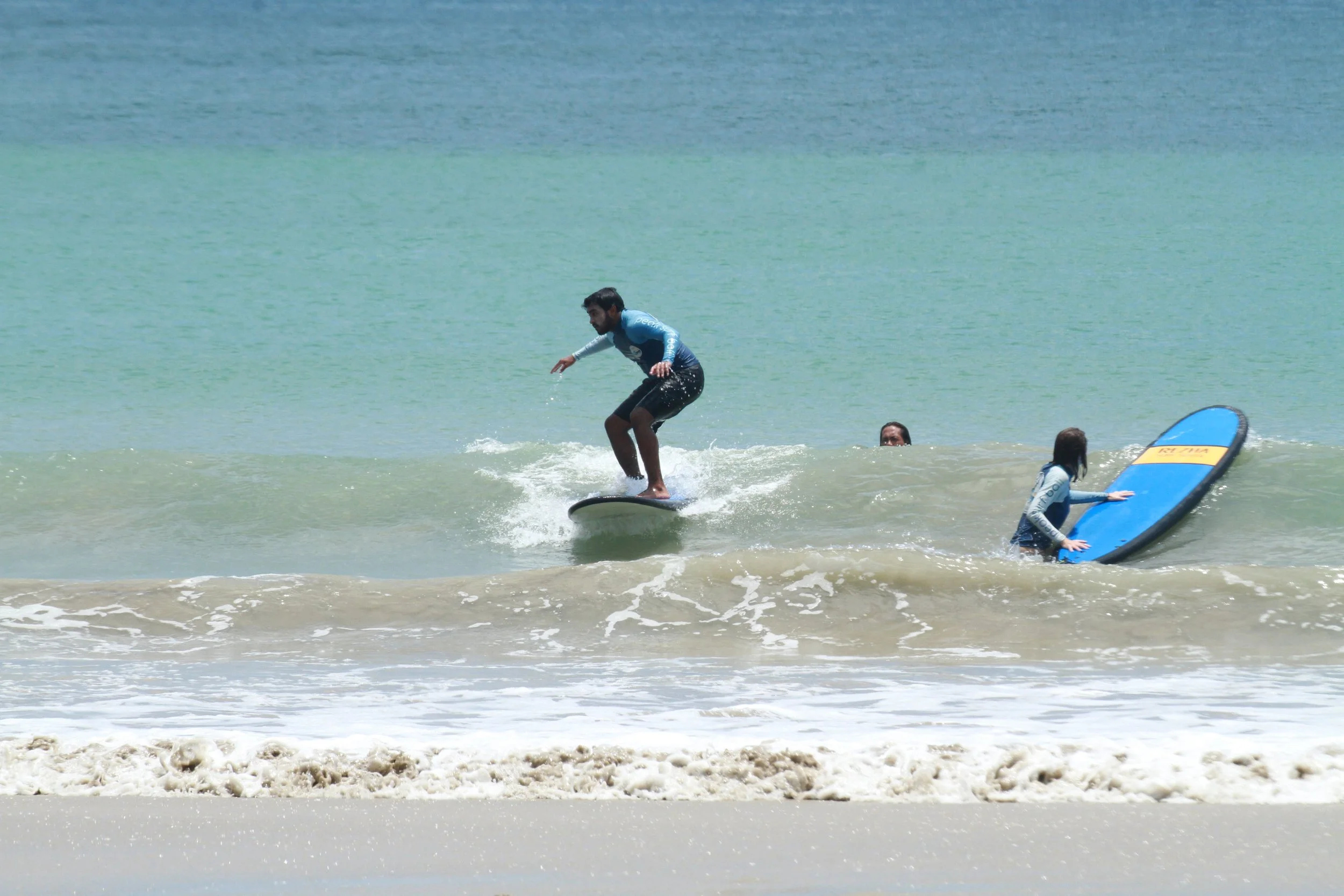 Group of Surf Students Solana Peak Surf Bali x After Break Point at Jimbaran Beach! @solana @solanabreakpoint peak surf school bali happy joy friendhip students riding waves at Jimbaran Uluwatu White sand crystal blue water clear water Peak Surf Scho