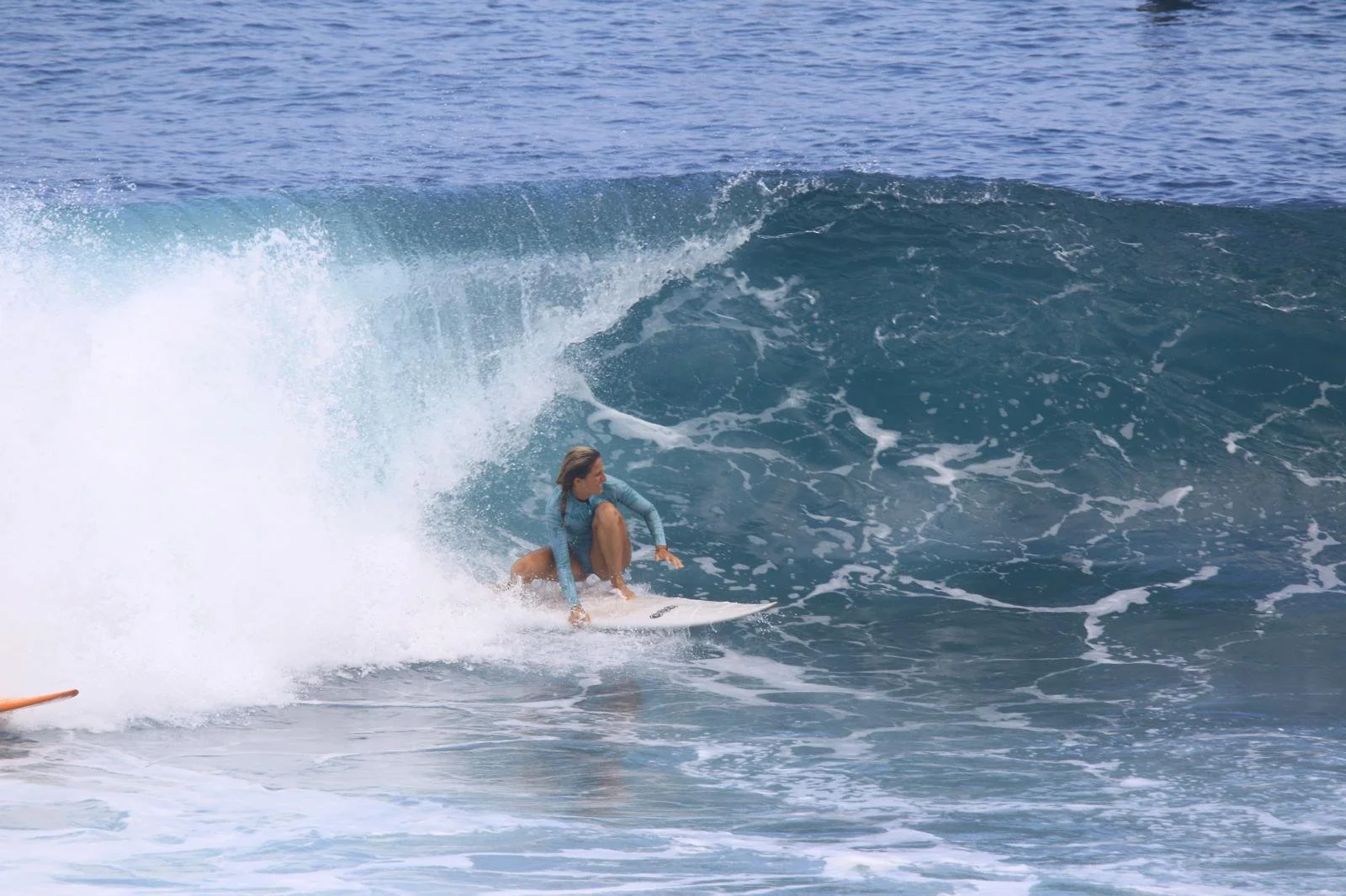 France French Student Surfer Peak Surf Bali Students at Padang Padang Beach Uluwatu Surfing Peak Surf Bali Surf School high five smiles fun happy joy friendship surfing beautiful beach crystal clear water white sand French student intermediate surf l
