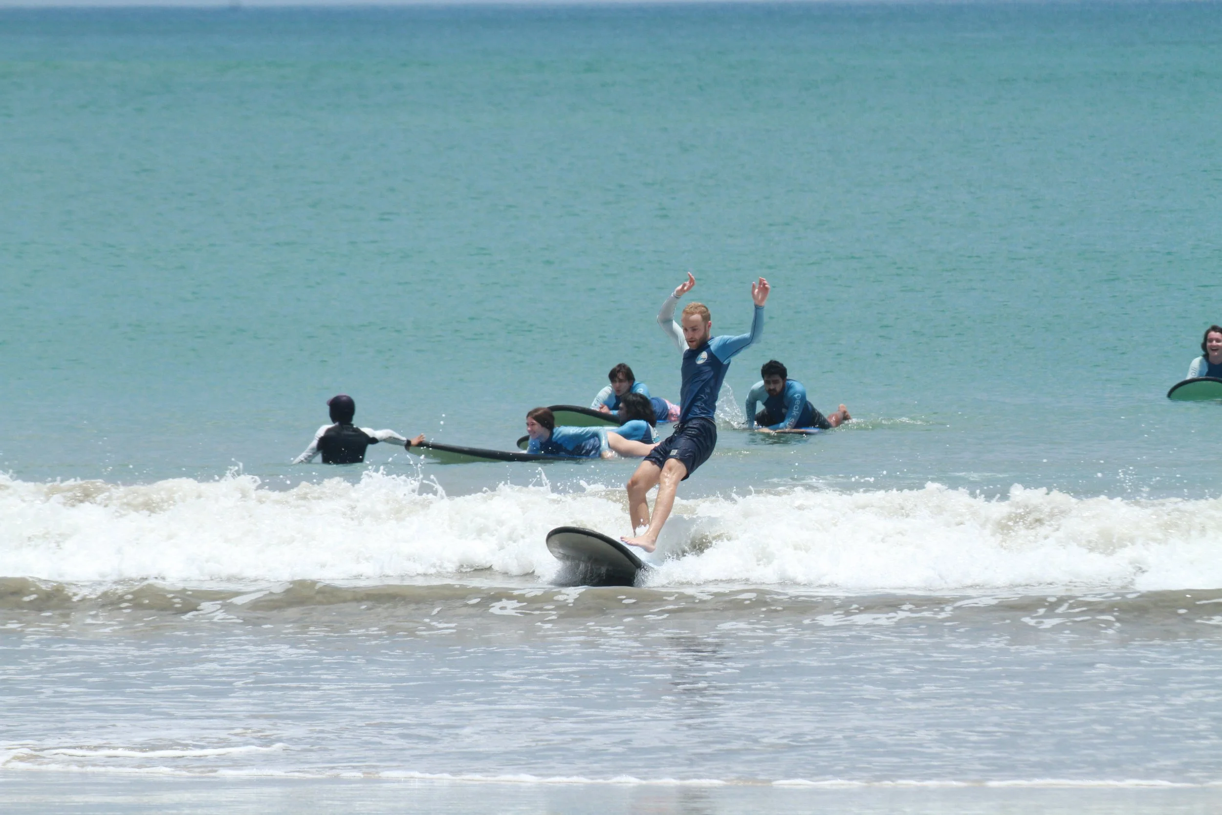 Group of Surf Students Solana Peak Surf Bali x After Break Point at Jimbaran Beach! @solana @solanabreakpoint peak surf school bali happy joy friendhip students riding waves at Jimbaran Uluwatu White sand crystal blue water clear water Peak Surf Scho