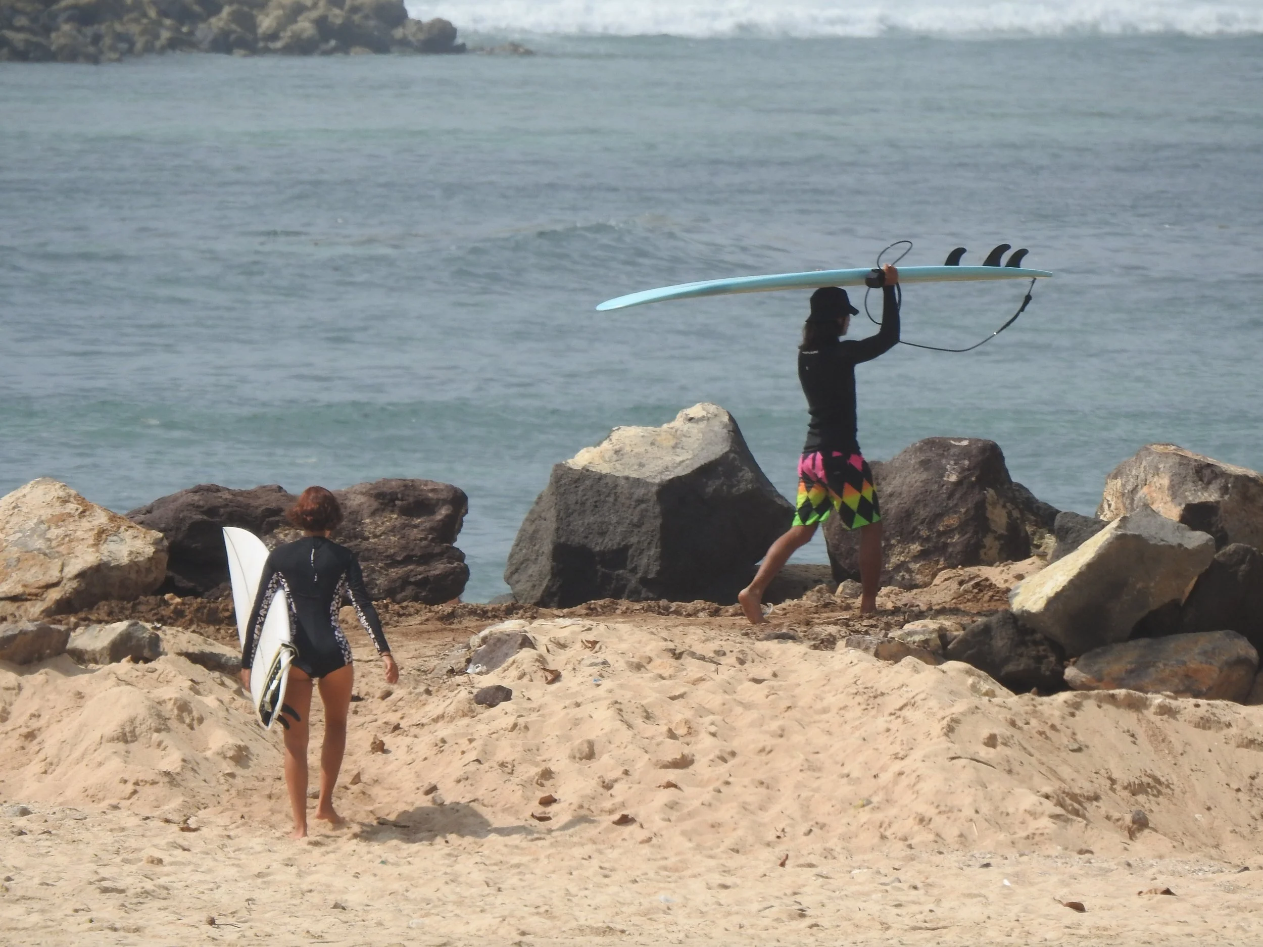 Rym Renom France French Peak Surf Bali Students at Padang Padang Beach Uluwatu Surfing Peak Surf Bali Surf School high five smiles fun happy joy friendship surfing beautiful beach crystal clear water white sand celebrity pink teaching surf surfer gir