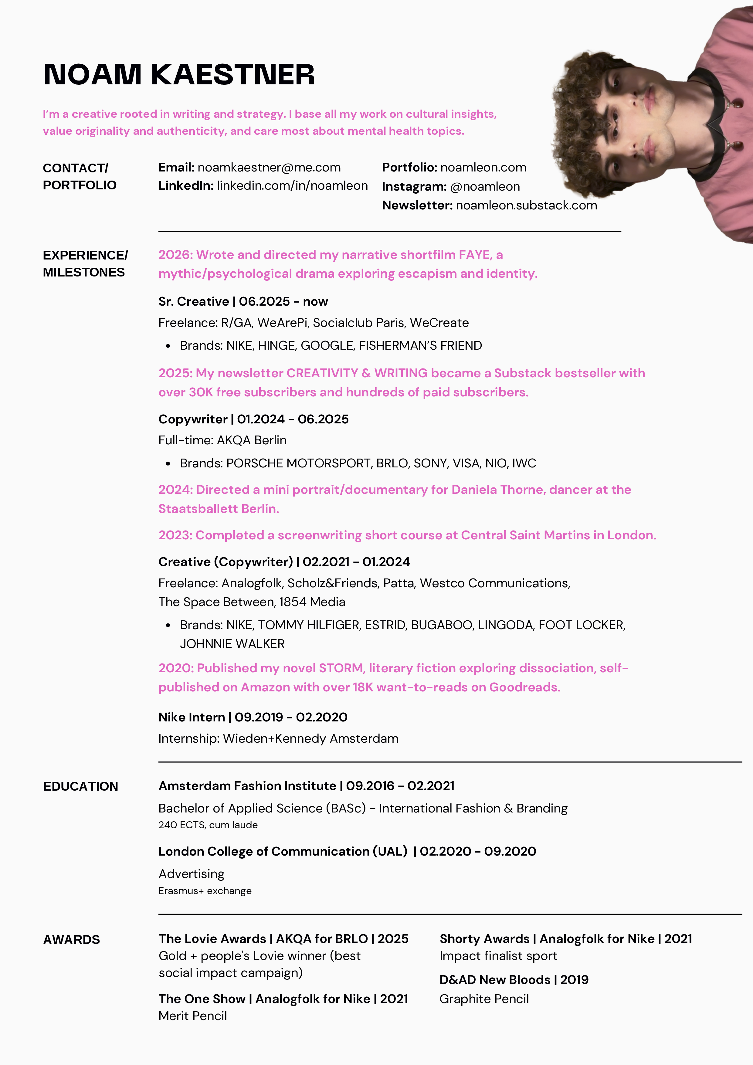 A digital resume of Noam Kaestner, highlighting their name, professional summary, contact information, experience, education, and awards in black and pink text on a white background with a partial image of a young person with curly hair in a pink shirt on the top right corner.
