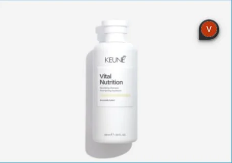 A white bottle of Keune Vital Nutrition shampoo with a pump top.