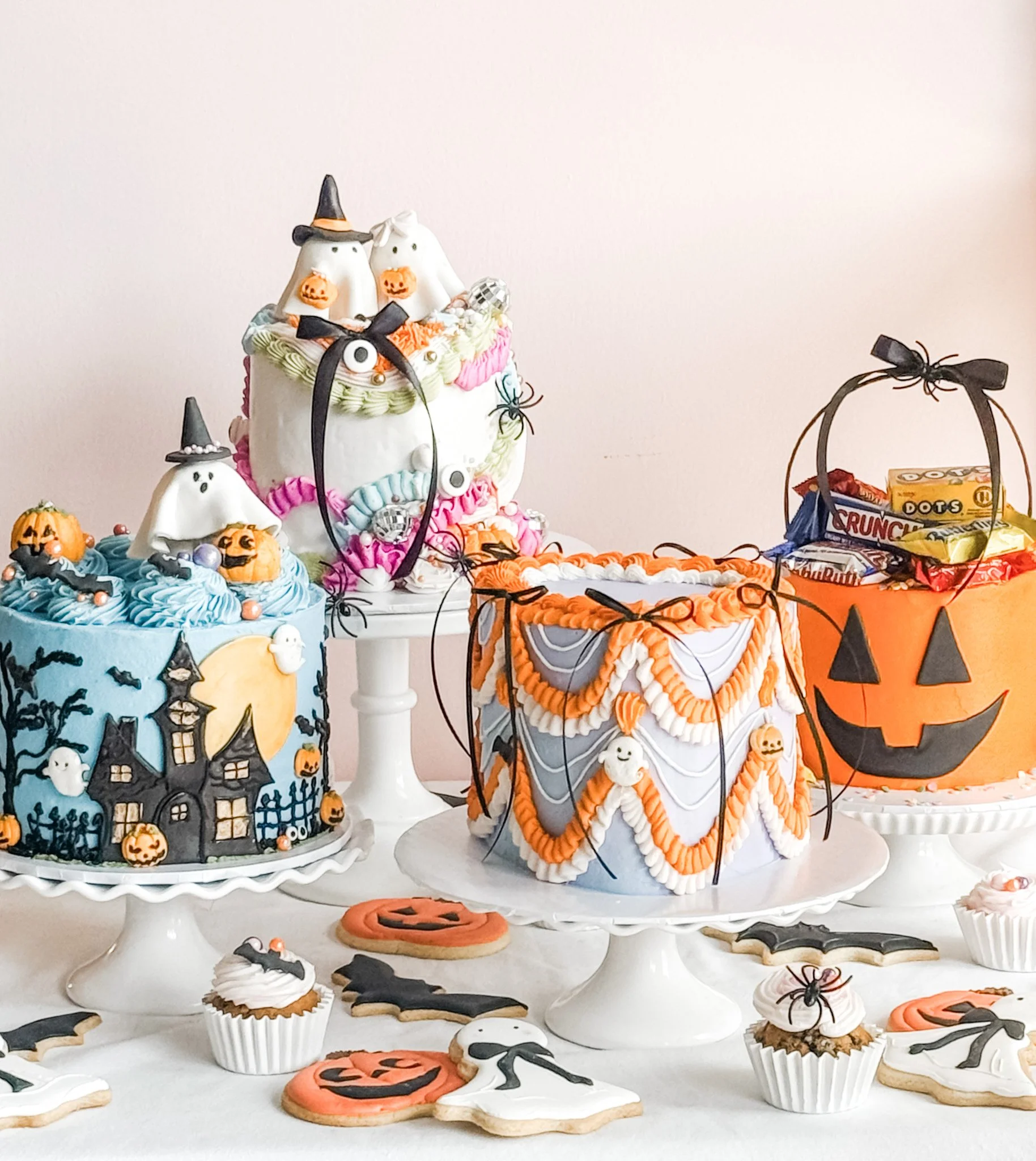Sweet Stacy's Palm Beach Halloween cake collection featuring custom ghost cakes, a haunted house cake, vintage buttercream cakes, a jack-o'-lantern candy cake, and festive Halloween cookies and cupcakes.