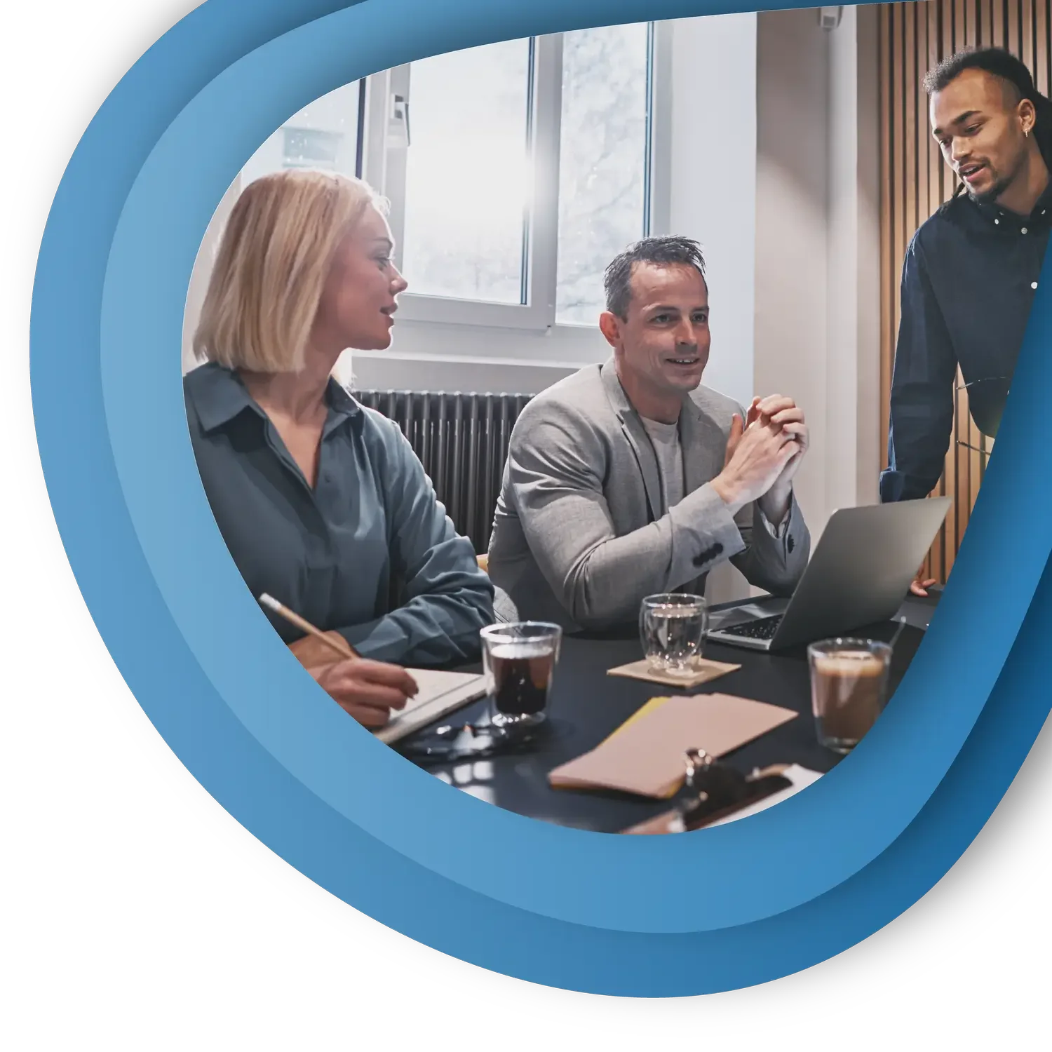 Man and woman sat in a meeting room