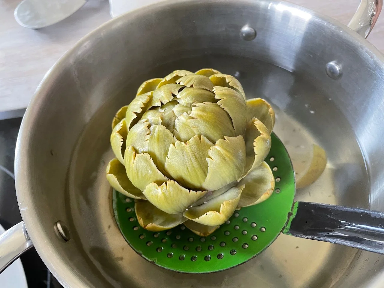 Artichoke just out of a boiling pan