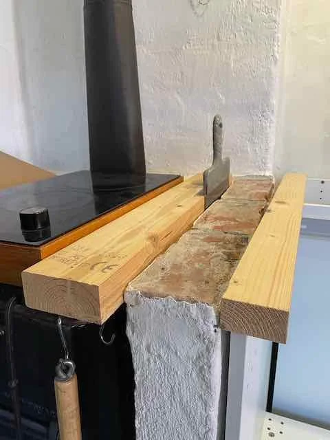 Preparation for levelling fireproof wall