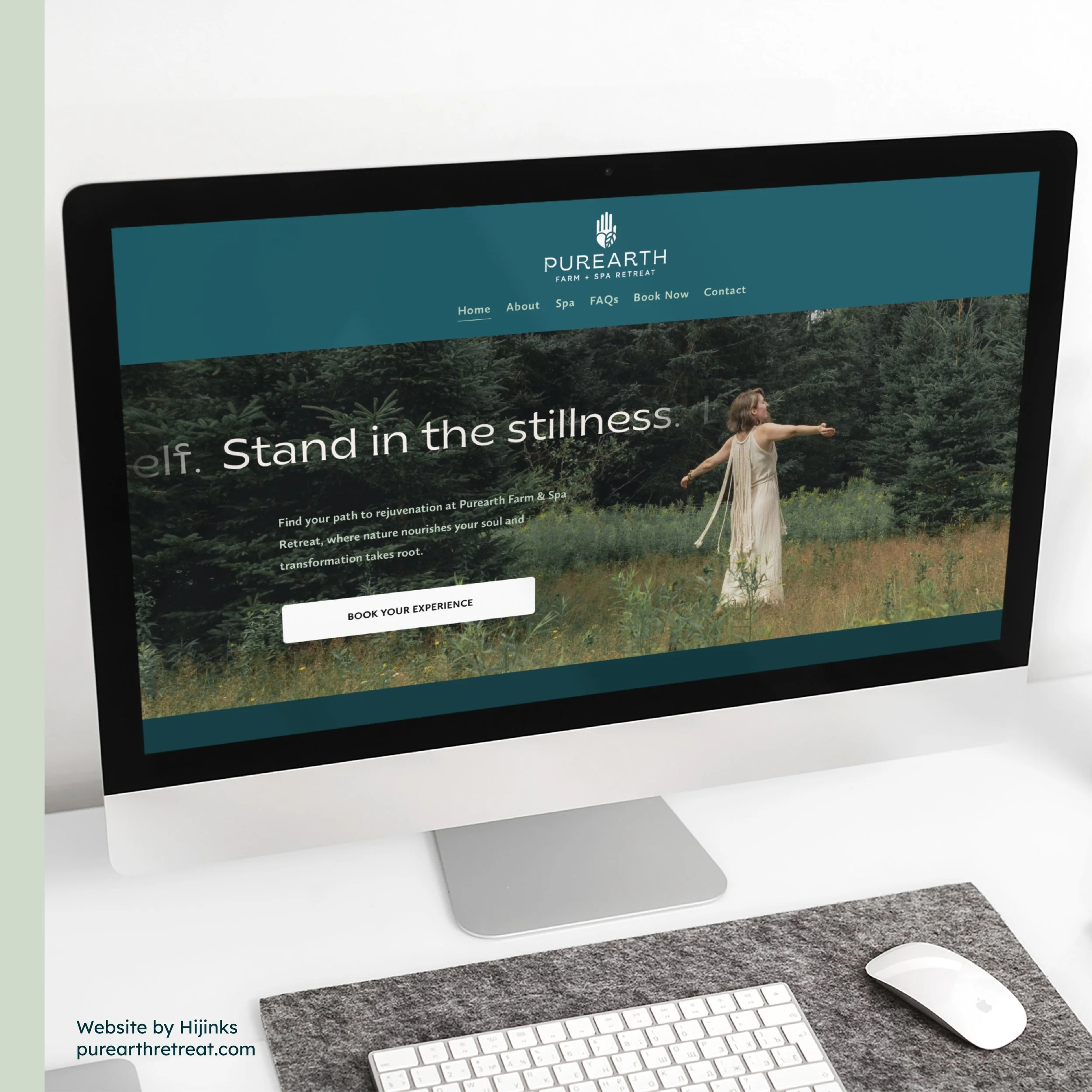 Computer monitor displaying the homepage of Purearth Farm & Spa Retreat website with a woman standing in a forested area, arms outstretched. - Hijinks Design Agency
