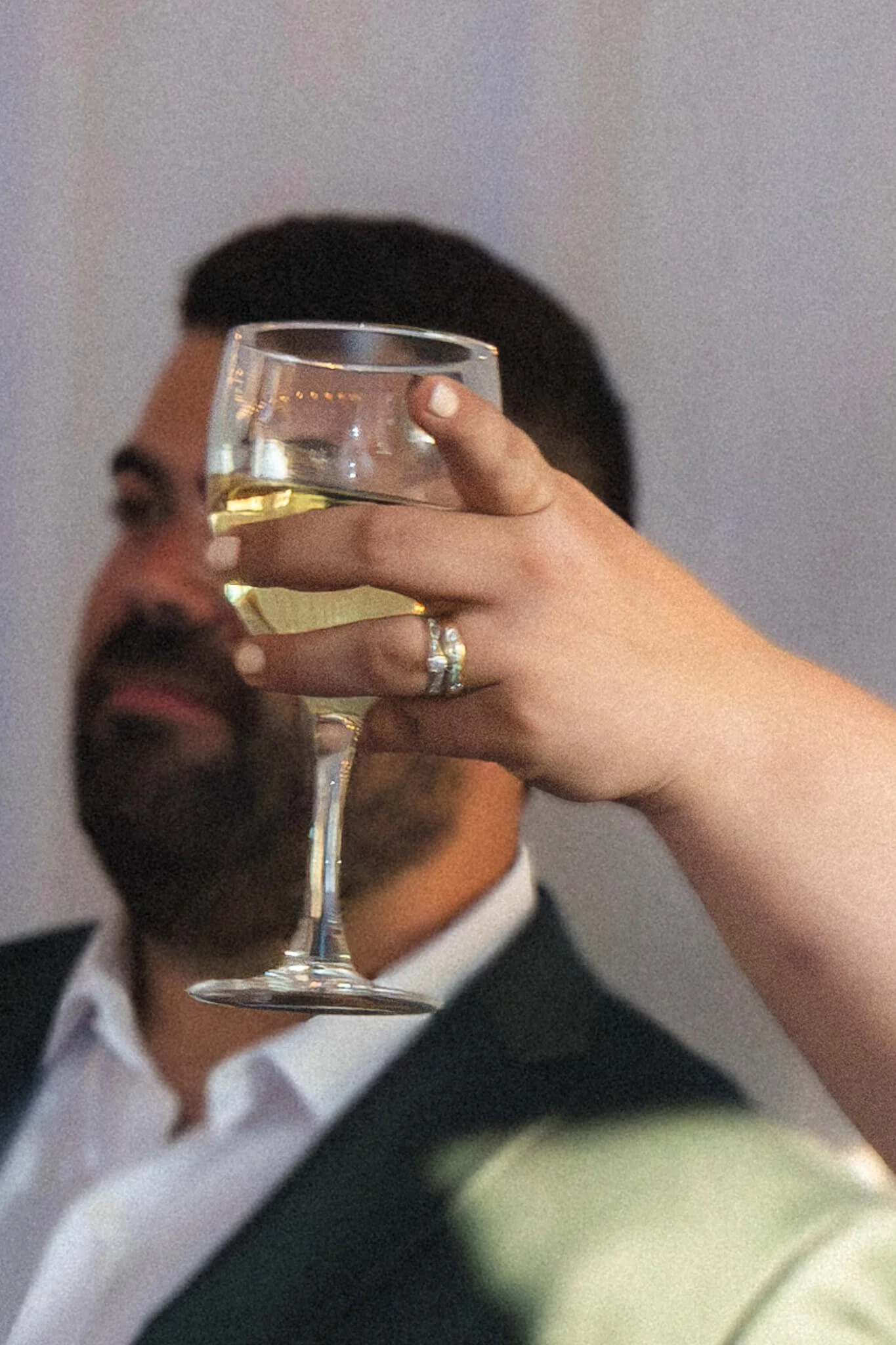 wedding-portrait-toast-white-wine-with-ring.jpg